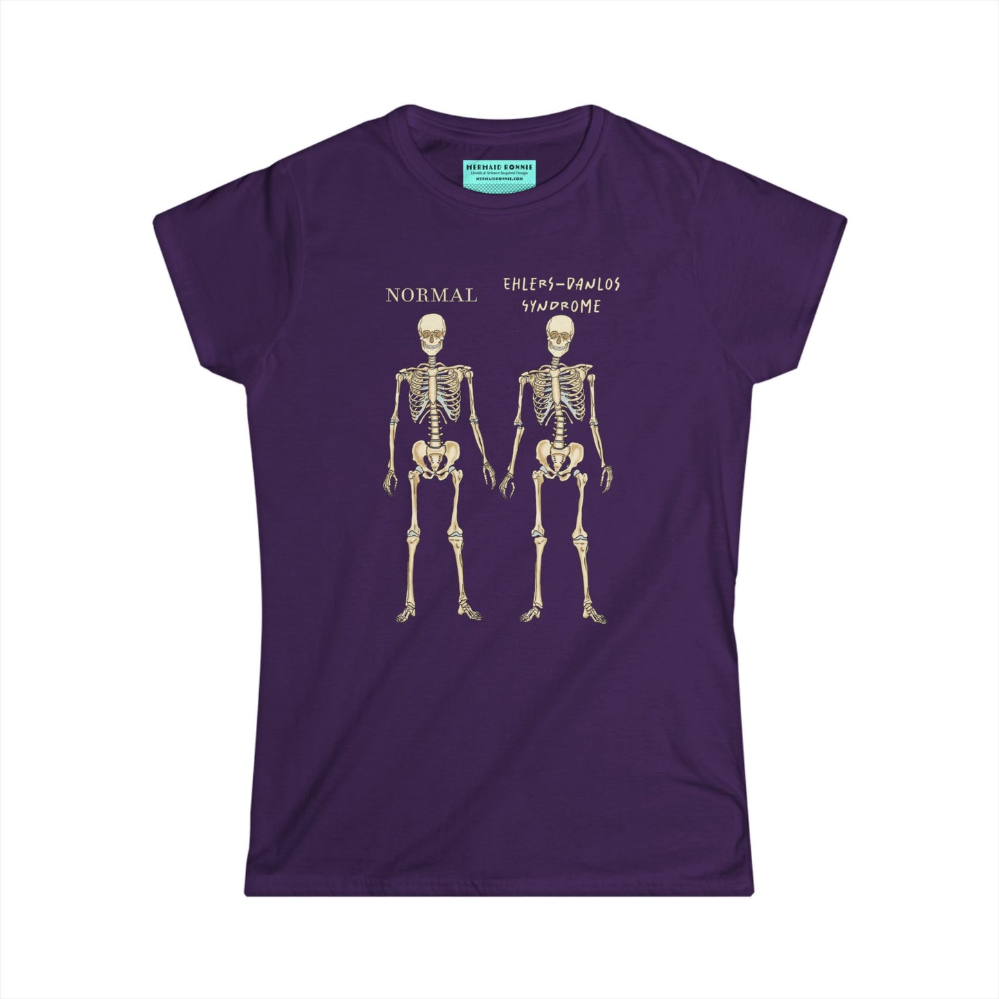 Women’s t-shirt in dark purple with two skeletons side by side. The first is labeled 'Normal' and the second is labeled 'Ehlers-Danlos Syndrome,' visually illustrating the skeletal effects of EDS.