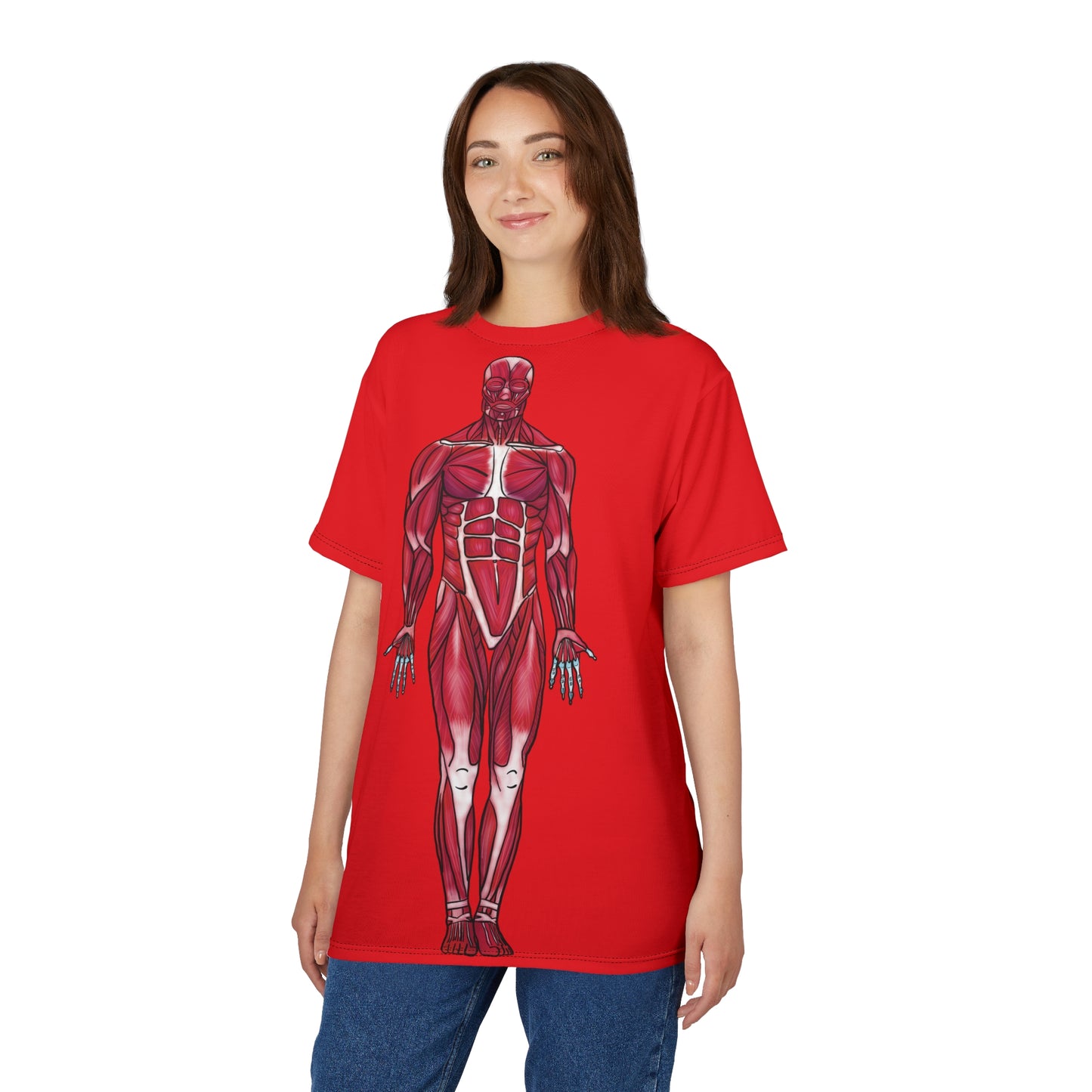 Woman wearing a red athletic t-shirt featuring a detailed anterior view diagram of the human muscular system printed on the front.