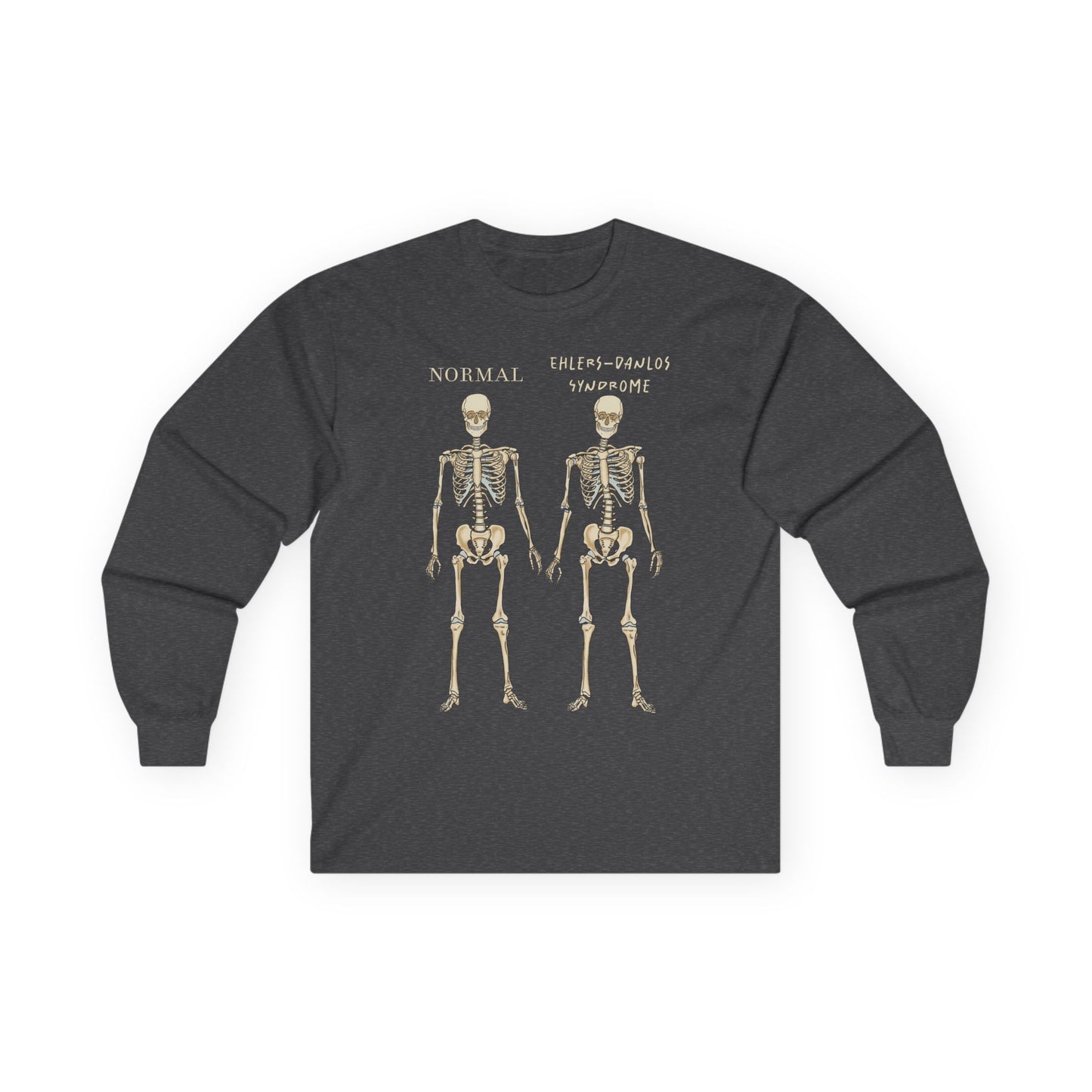 A grey long sleeve shirt with two skeletons side by side—one labeled "normal," the other "Ehlers-Danlos Syndrome"—visually showcasing the effects of EDS with a clever, anatomy-inspired twist.