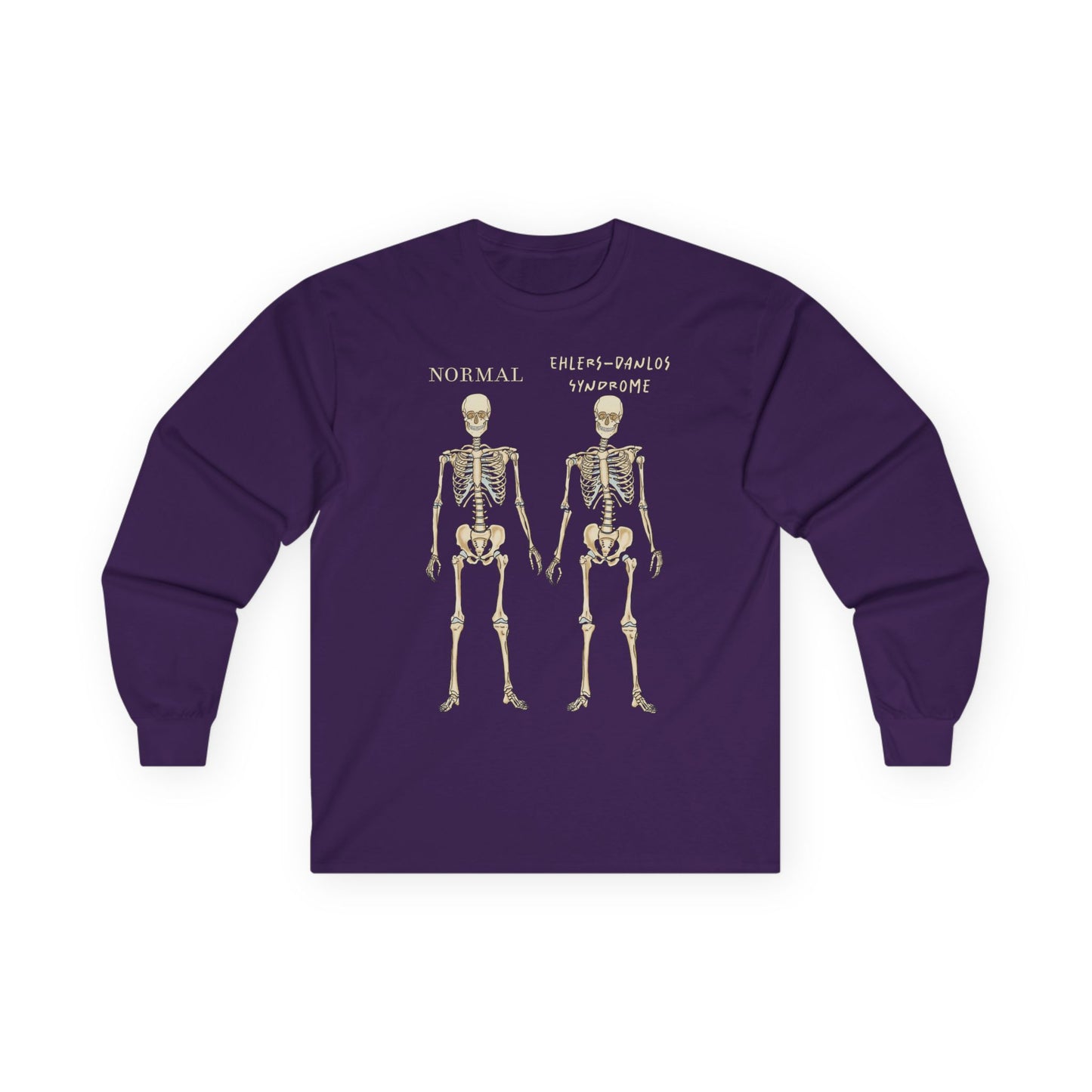 A purple long sleeve shirt with two skeletons side by side—one labeled "normal," the other "Ehlers-Danlos Syndrome"—visually showcasing the effects of EDS with a clever, anatomy-inspired twist.