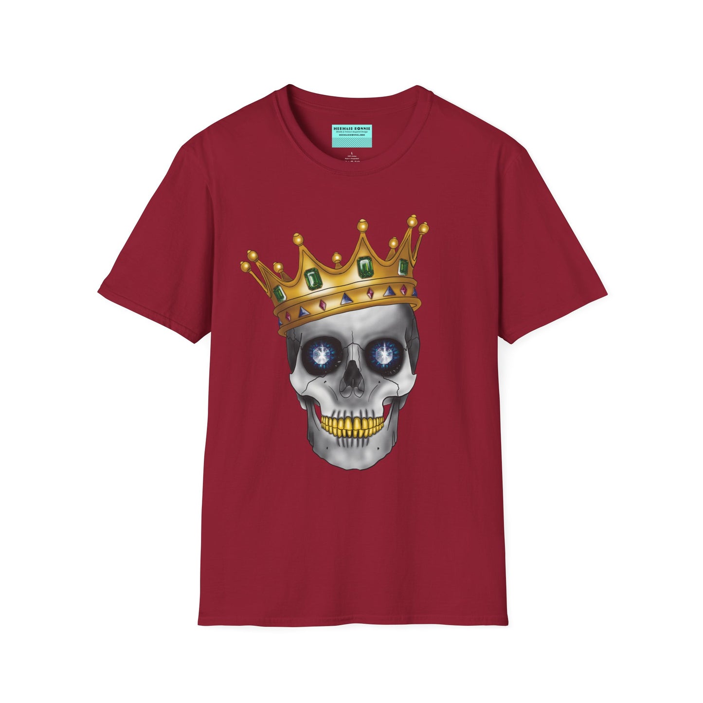 Red t-shirt featuring an anatomical skull wearing an ornate crown, with gold teeth, large sapphire gemstones in the eye sockets, and emeralds and rubies decorating the crown.