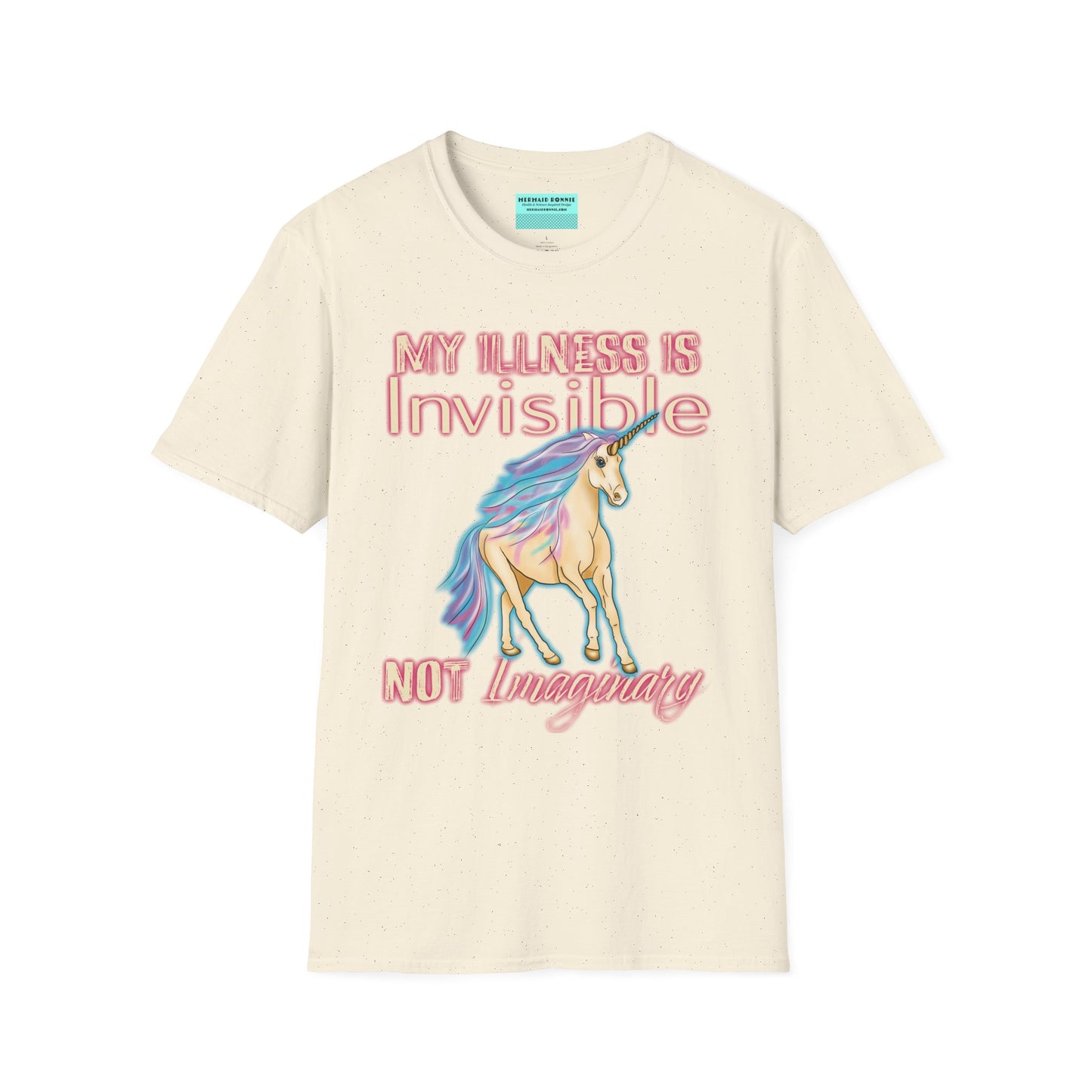 Beige shirt featuring a drawing of a unicorn and the phrase 'My illness is invisible not imaginary'.