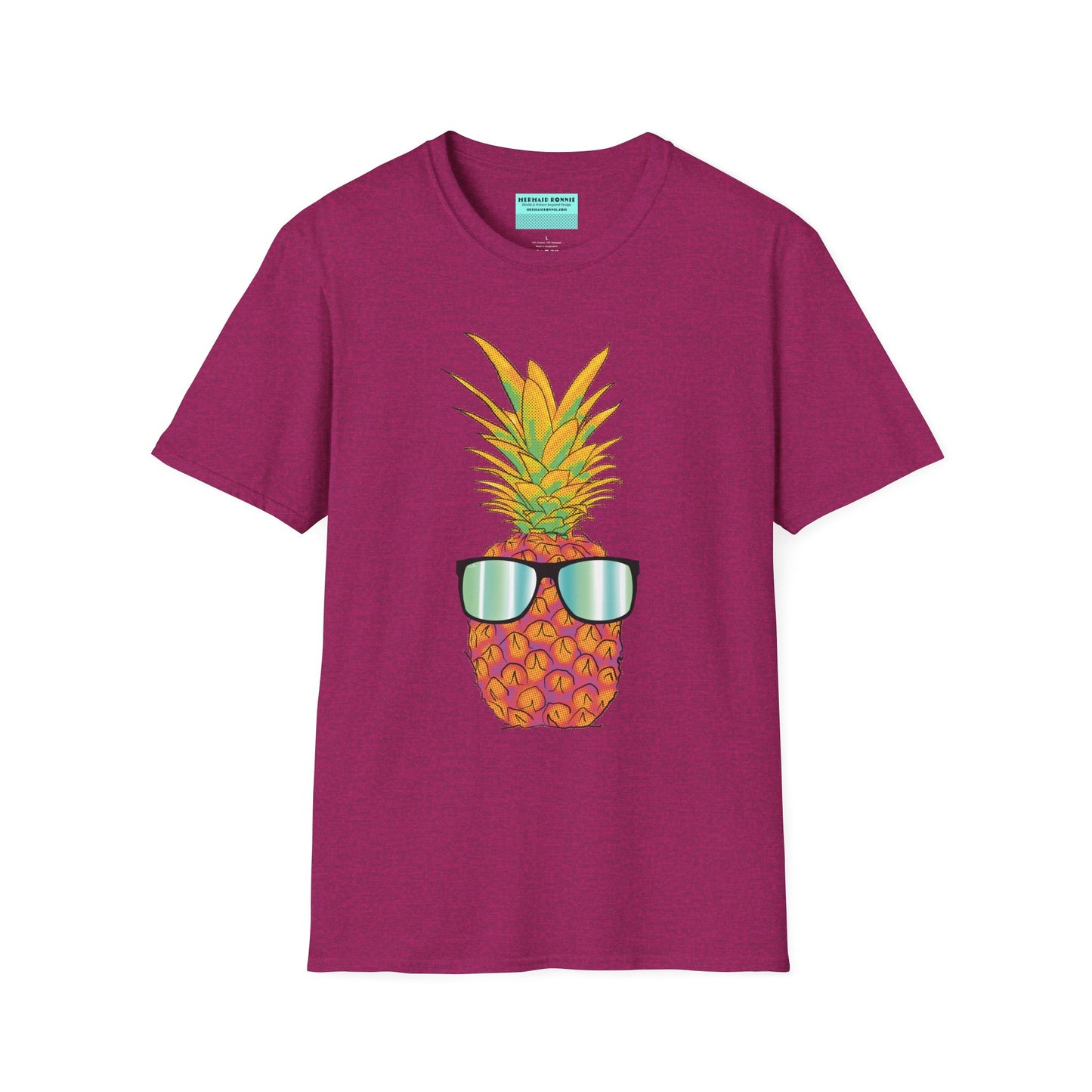 Fuscia t-shirt featuring a drawing of a pineapple wearing sunglasses.
