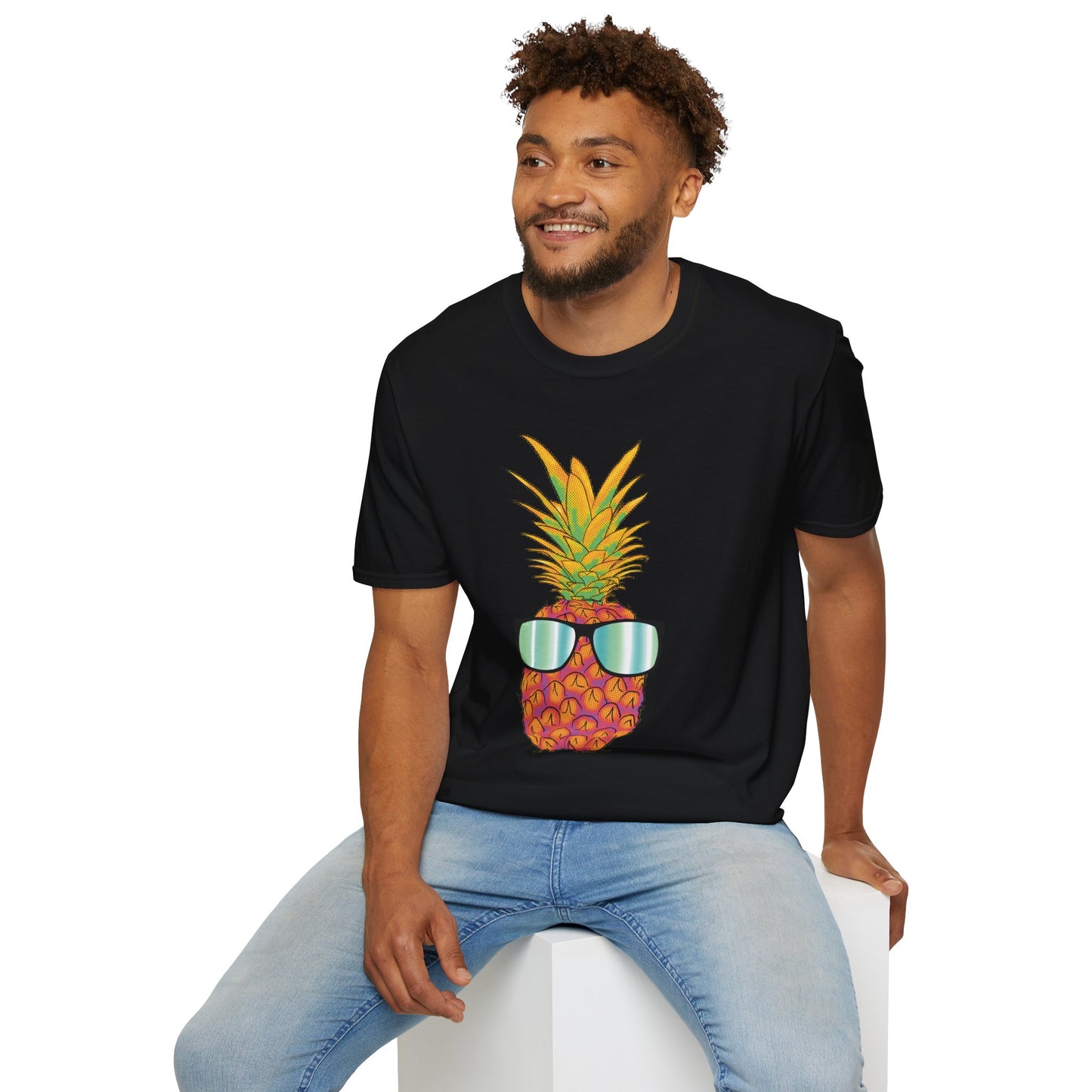 Man wearing a black t-shirt featuring a drawing of a pineapple wearing sunglasses.