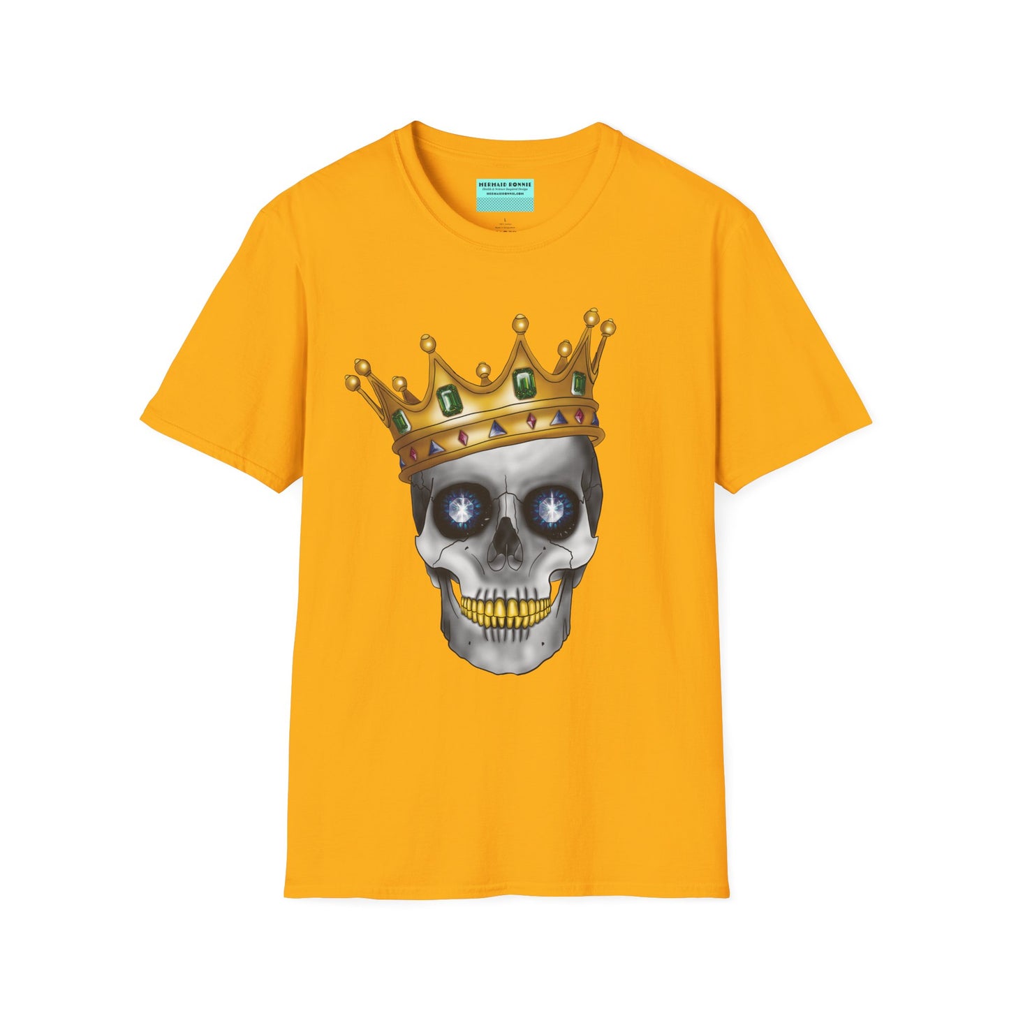 Yellow t-shirt featuring an anatomical skull wearing an ornate crown, with gold teeth, large sapphire gemstones in the eye sockets, and emeralds and rubies decorating the crown.