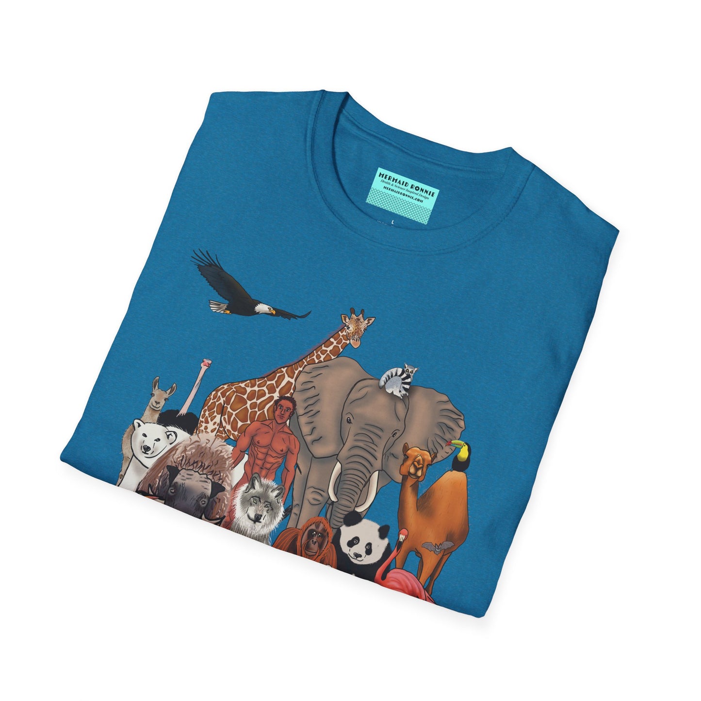 Folded blue unisex short sleeve tee featuring a diverse group of illustrated animals—like an elephant, bird, cat, and more—gathered around a human in the center. Below the image, the text reads "humans are animals too," celebrating our place in the animal kingdom with a touch of humor and humility.