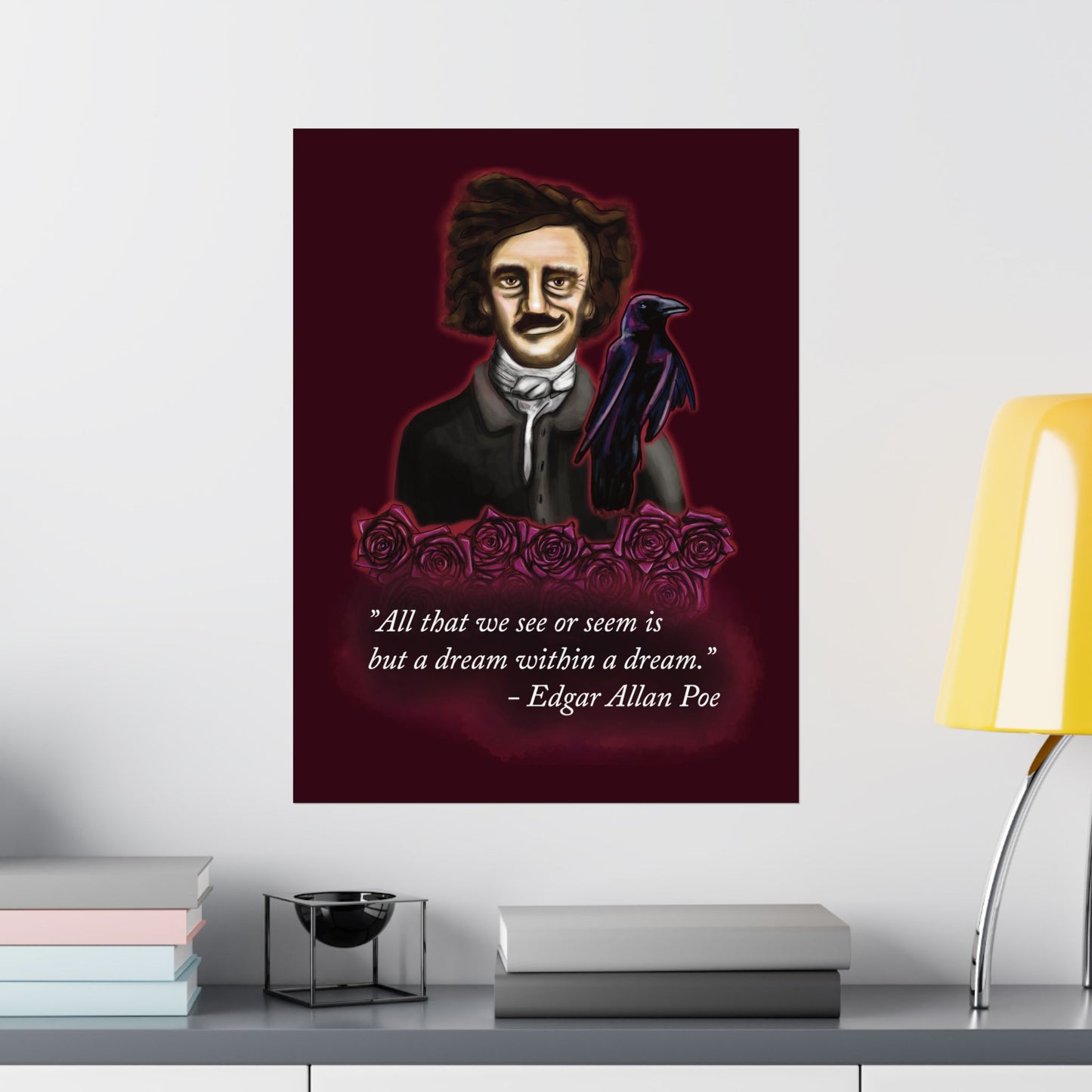 An extra-large moody poster of Edgar Allan Poe hung in an office setting. He is wearing a wry smile as he’s surrounded by crimson roses and a raven, with a rich burgundy background—because even the master of macabre has a soft spot for gothic romance.