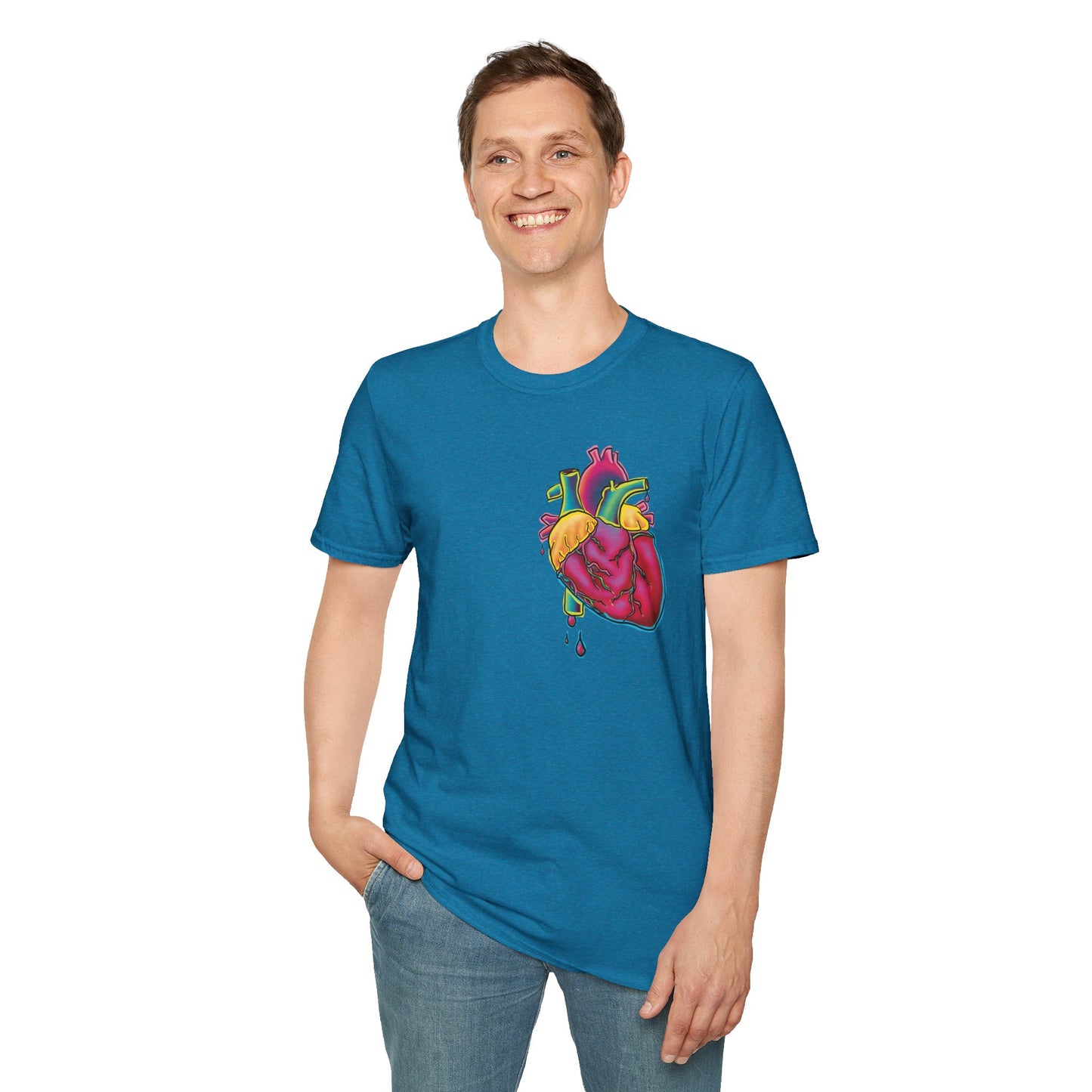 Man wearing a blue unisex short sleeve t-shirt featuring a bold neon anatomical heart front and off-center, complete with dripping blood vessels—because nothing says “wear your heart on your sleeve” like wearing it smack on your chest in highlighter tones.