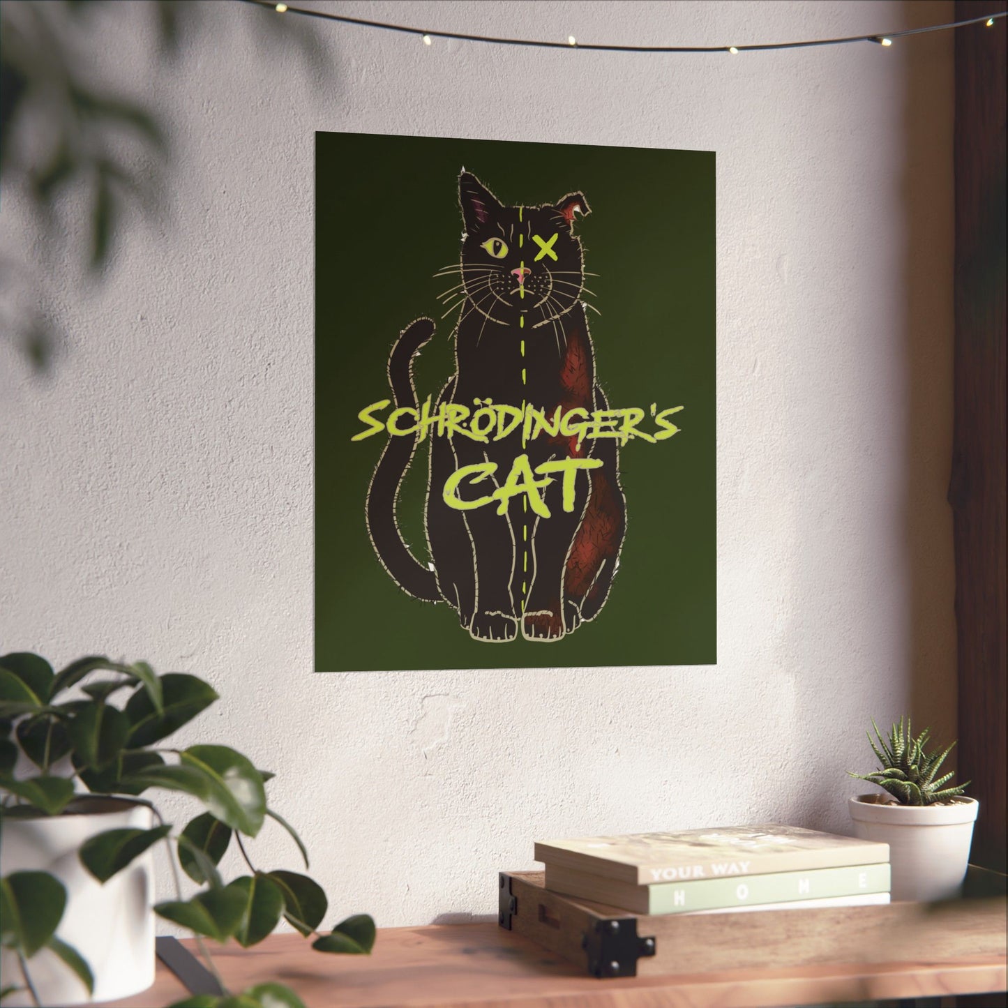 A large thought-provoking Schrödinger's Cat poster set against a dark green background, featuring a black cat split down the middle—half alive, half dead. The phrase “Schrödinger's Cat” sits boldly across the image, capturing the paradox of quantum physics with a dash of feline mystery.