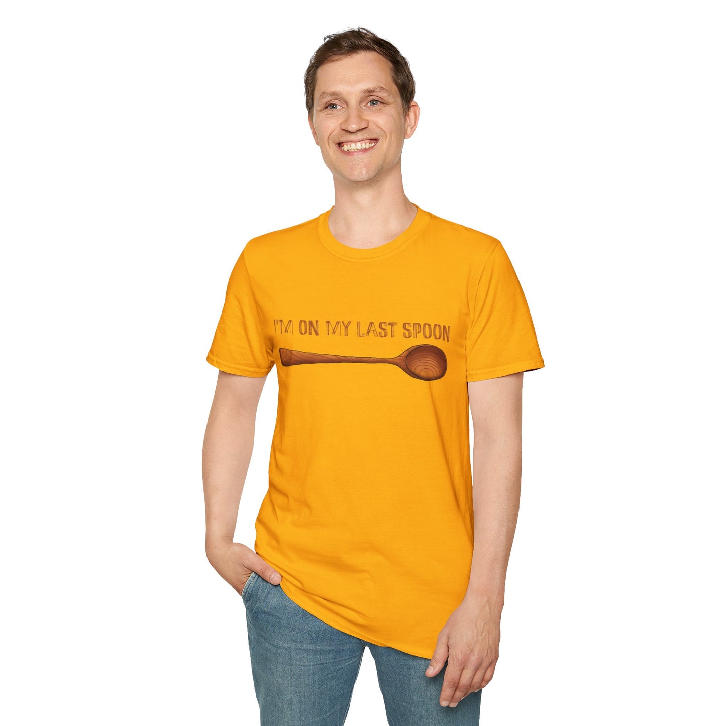 Man wearing a yellow t-shirt with an illustration of a single wooden spoon and the phrase 'I'm on my last spoon' printed on the front.