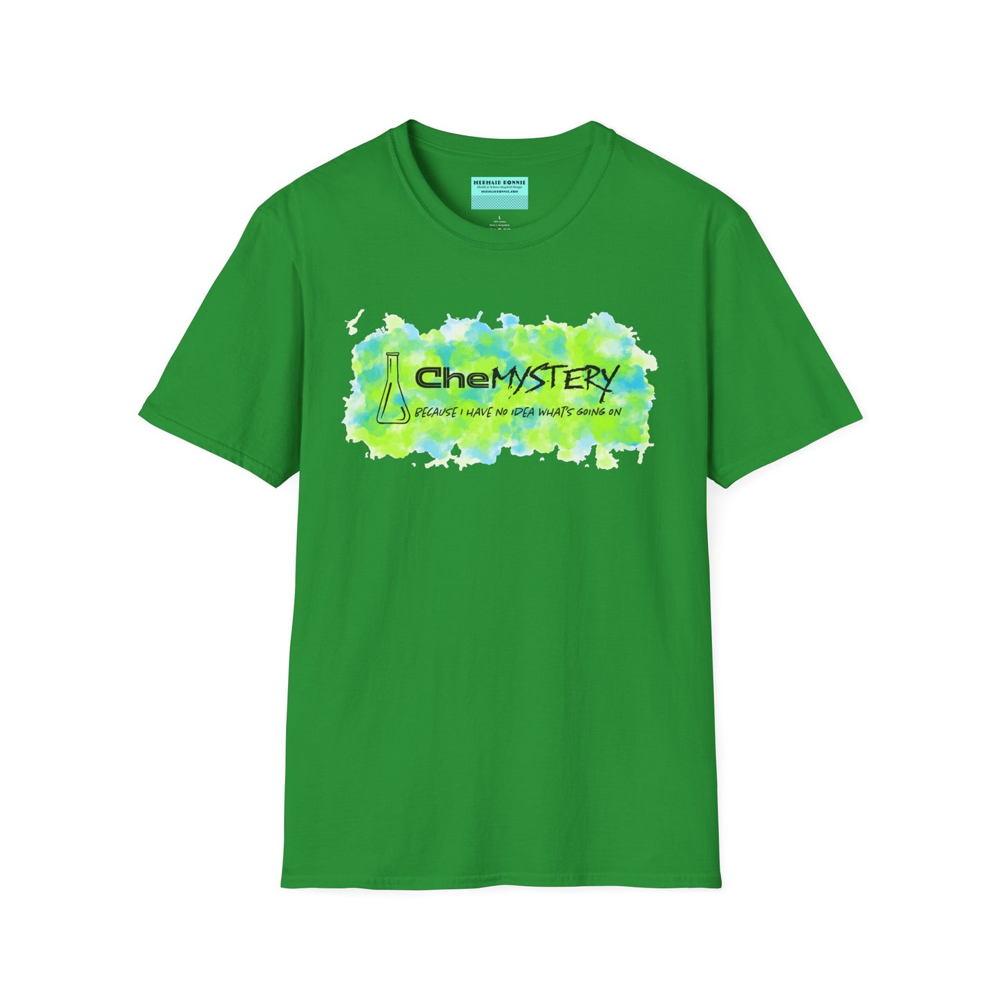 Green short-sleeve unisex t-shirt with playful watercolor-style blue and green splotches, a simple line-drawn beaker, and the witty phrase “CheMystery: because I have no idea what’s going on”—perfect for anyone who’s ever been personally victimized by the periodic table.