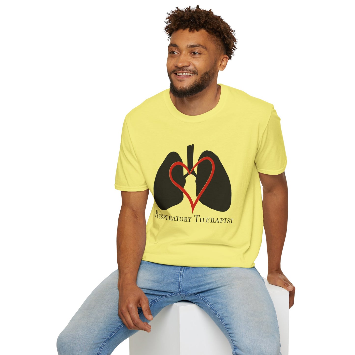 Man wearing a yellow unisex short sleeve t-shirt with a graphic illustration of a heart and lungs; the words "respiratory therapist" are printed below the design.