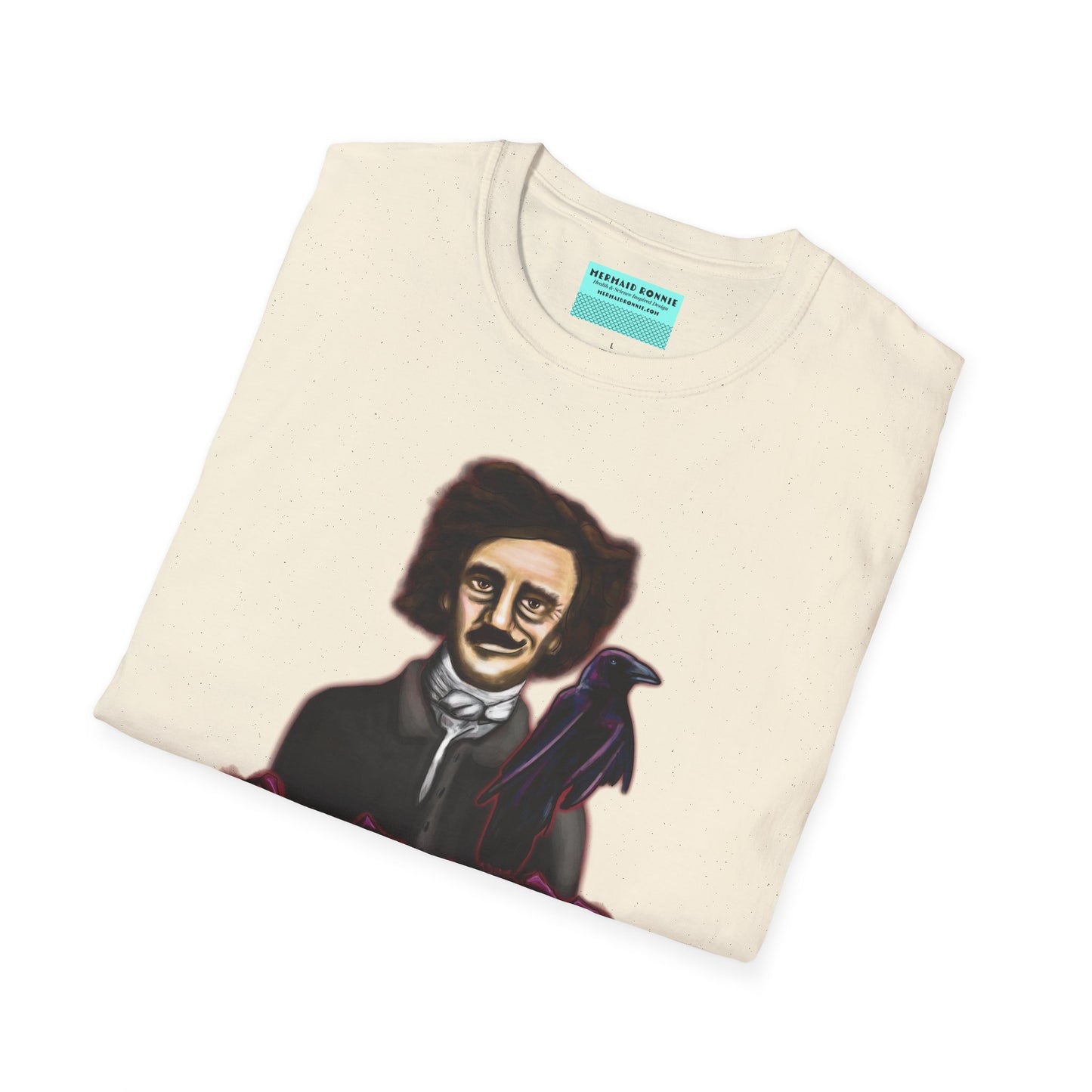 Folded beige t-shirt featuring a drawing of Edgar Allan Poe with a raven perched nearby and red roses surrounding them, along with the quote 'All that we see or seem is but a dream within a dream.'