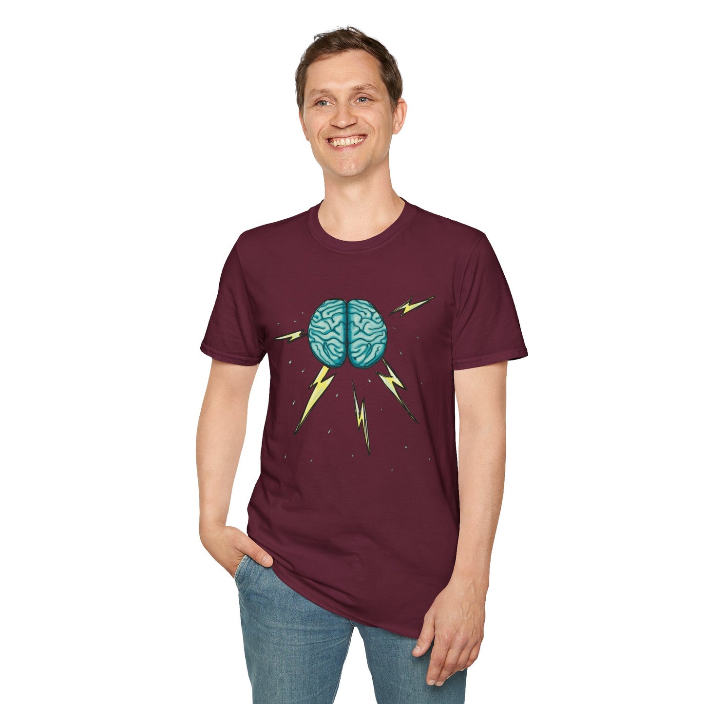 Man wearing a burgundy unisex short sleeve tee featuring an illustration of a brain with lightning bolts and rain pouring from it, giving a literal twist to the term "brainstorm"—because sometimes, even the best ideas need a little weathering!