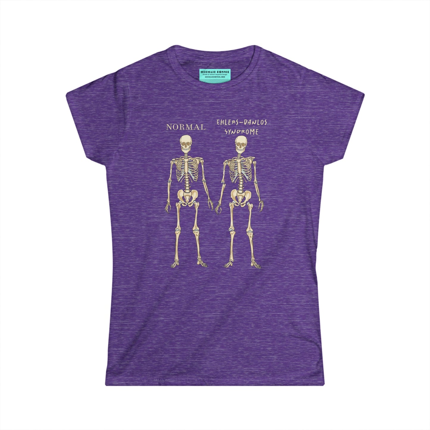 Women’s t-shirt in heather purple with two skeletons side by side. The first is labeled 'Normal' and the second is labeled 'Ehlers-Danlos Syndrome,' visually illustrating the skeletal effects of EDS.