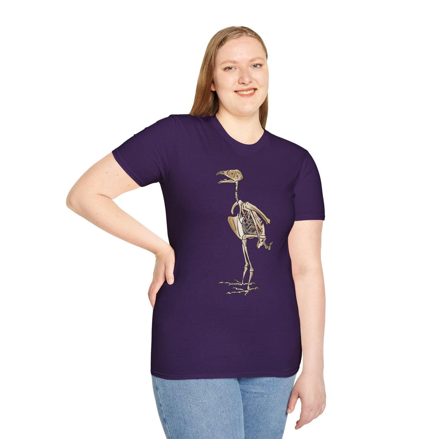 Woman wearing a purple unisex short sleeve t-shirt featuring a peregrine falcon skeleton—proof that even the fastest creature on Earth looks cool in x-ray vision.