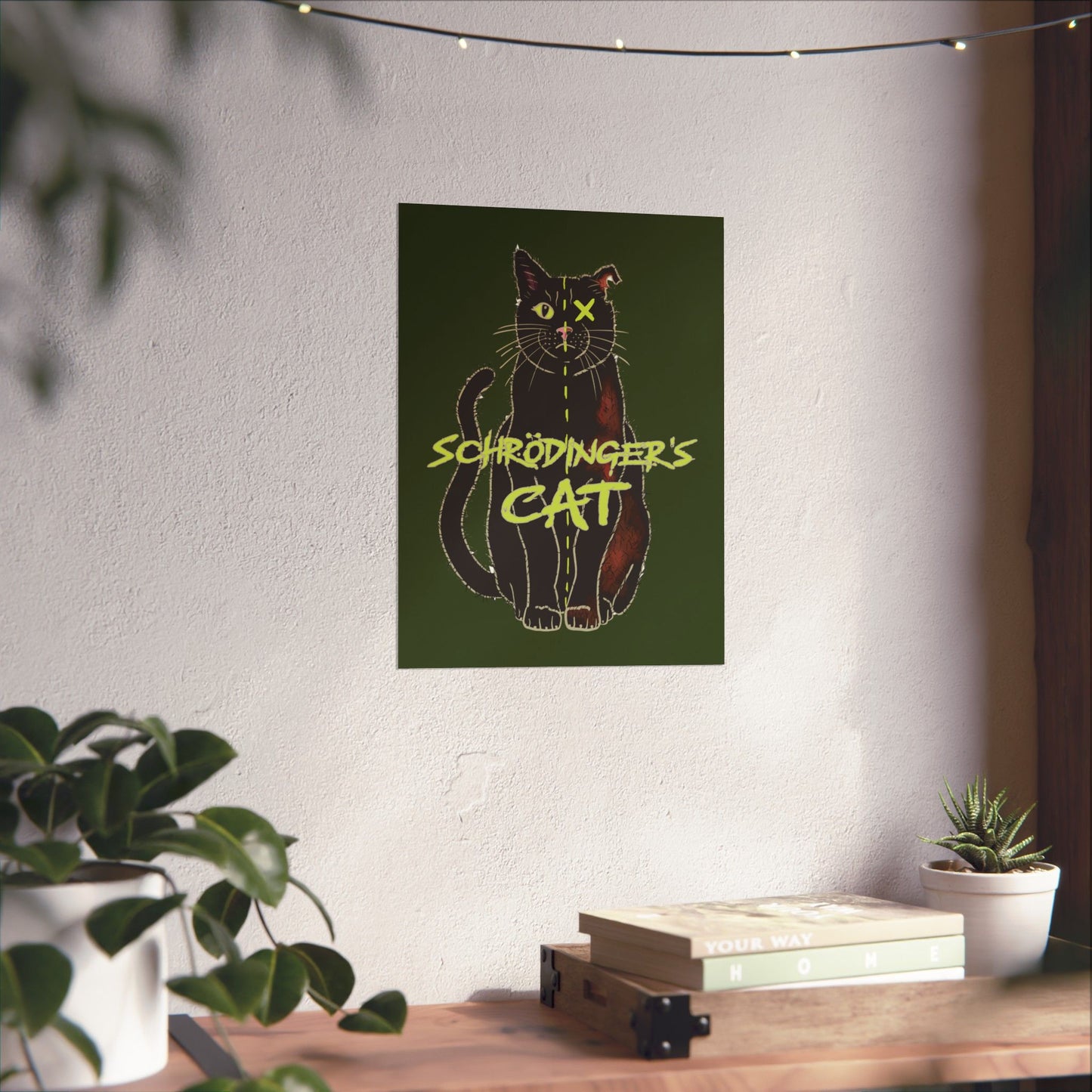 A medium thought-provoking Schrödinger's Cat poster set against a dark green background, featuring a black cat split down the middle—half alive, half dead. The phrase “Schrödinger's Cat” sits boldly across the image, capturing the paradox of quantum physics with a dash of feline mystery.