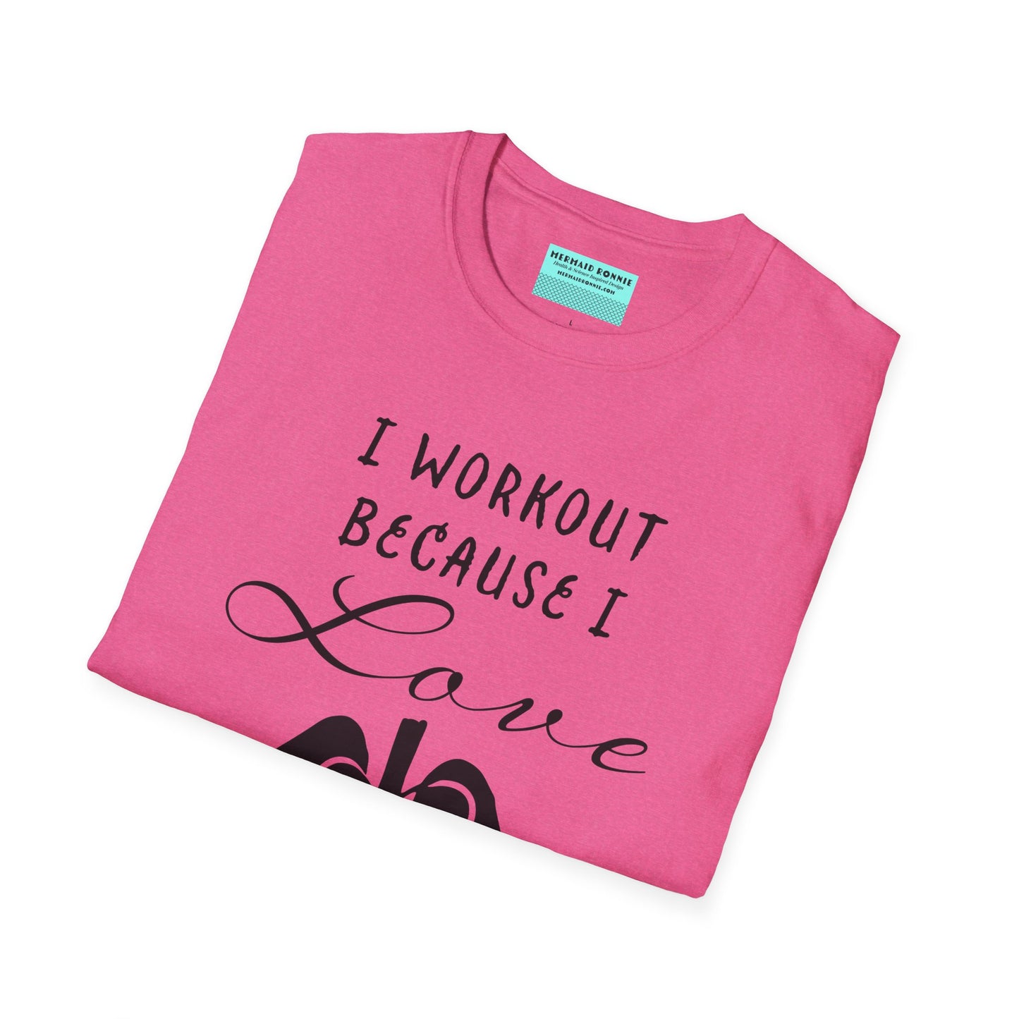 Folded pink unisex short sleeve t-shirt with a bold message: "I workout because I love my body," paired with a simple drawing of a heart and lungs—because cardio is more than a vibe, it’s biology.