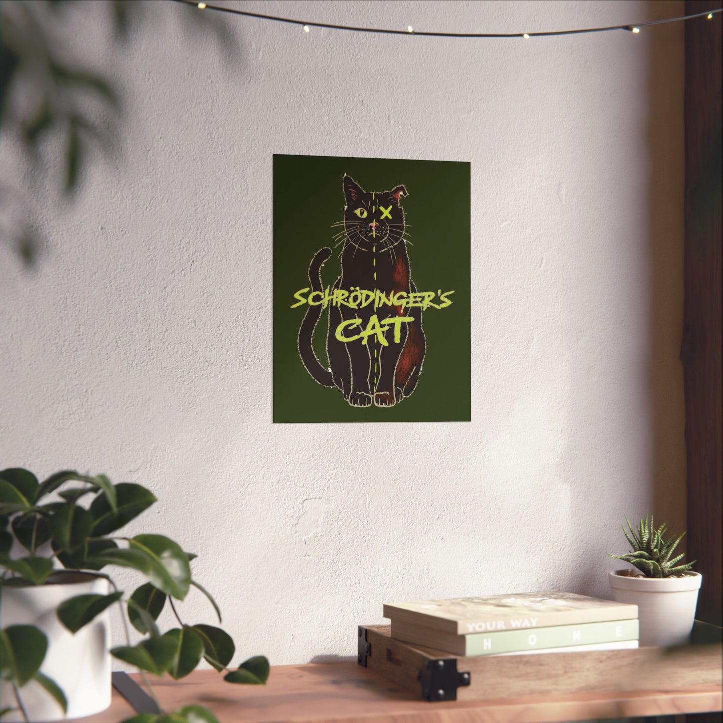 A small thought-provoking Schrödinger's Cat poster set against a dark green background, featuring a black cat split down the middle—half alive, half dead. The phrase “Schrödinger's Cat” sits boldly across the image, capturing the paradox of quantum physics with a dash of feline mystery.