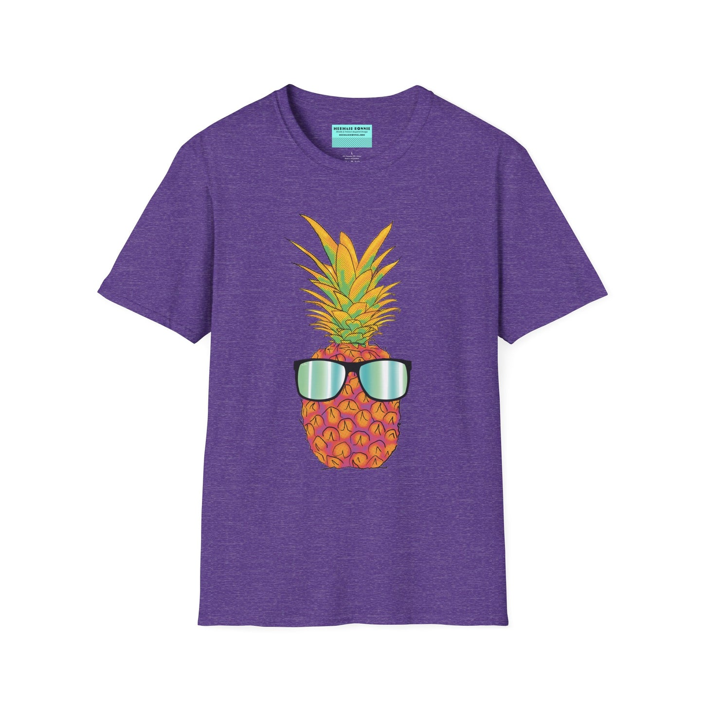 Purple t-shirt featuring a drawing of a pineapple wearing sunglasses.