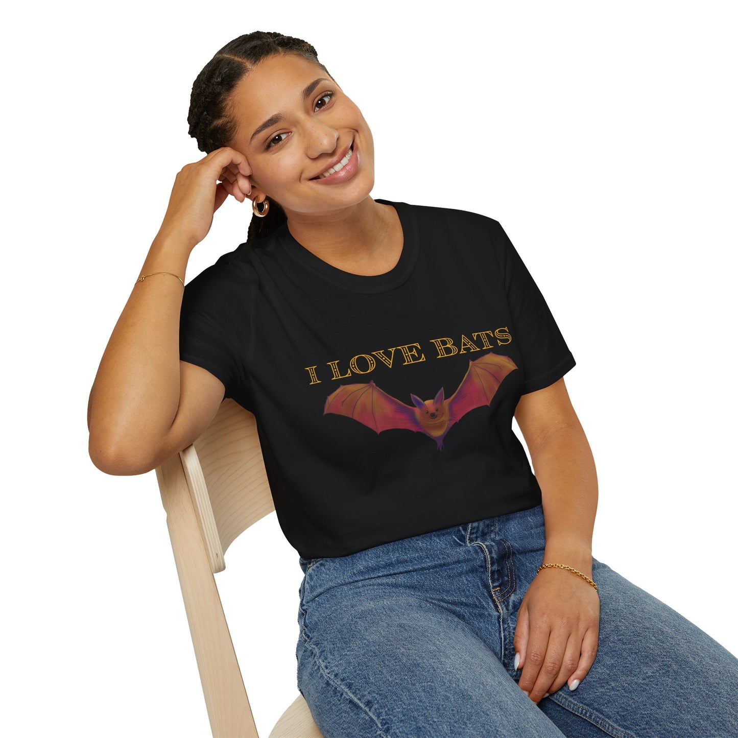 Woman wearing a black t-shirt featuring an irresistibly adorable brown bat with outstretched wings across the chest and the text “I love bats” — perfect for anyone who’s batty about flying mammals.