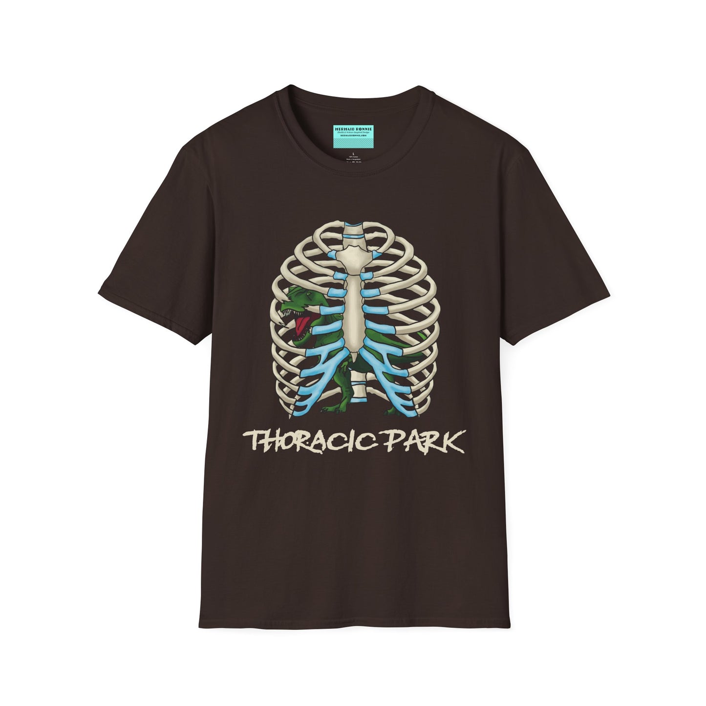 Brown unisex short sleeve tee with a clever Jurassic twist—an anatomical rib cage doubles as a prehistoric prison for a tiny T-Rex, with the punny caption "Thoracic Park" below. It's dino-mite meets anatomy class in the best way possible.