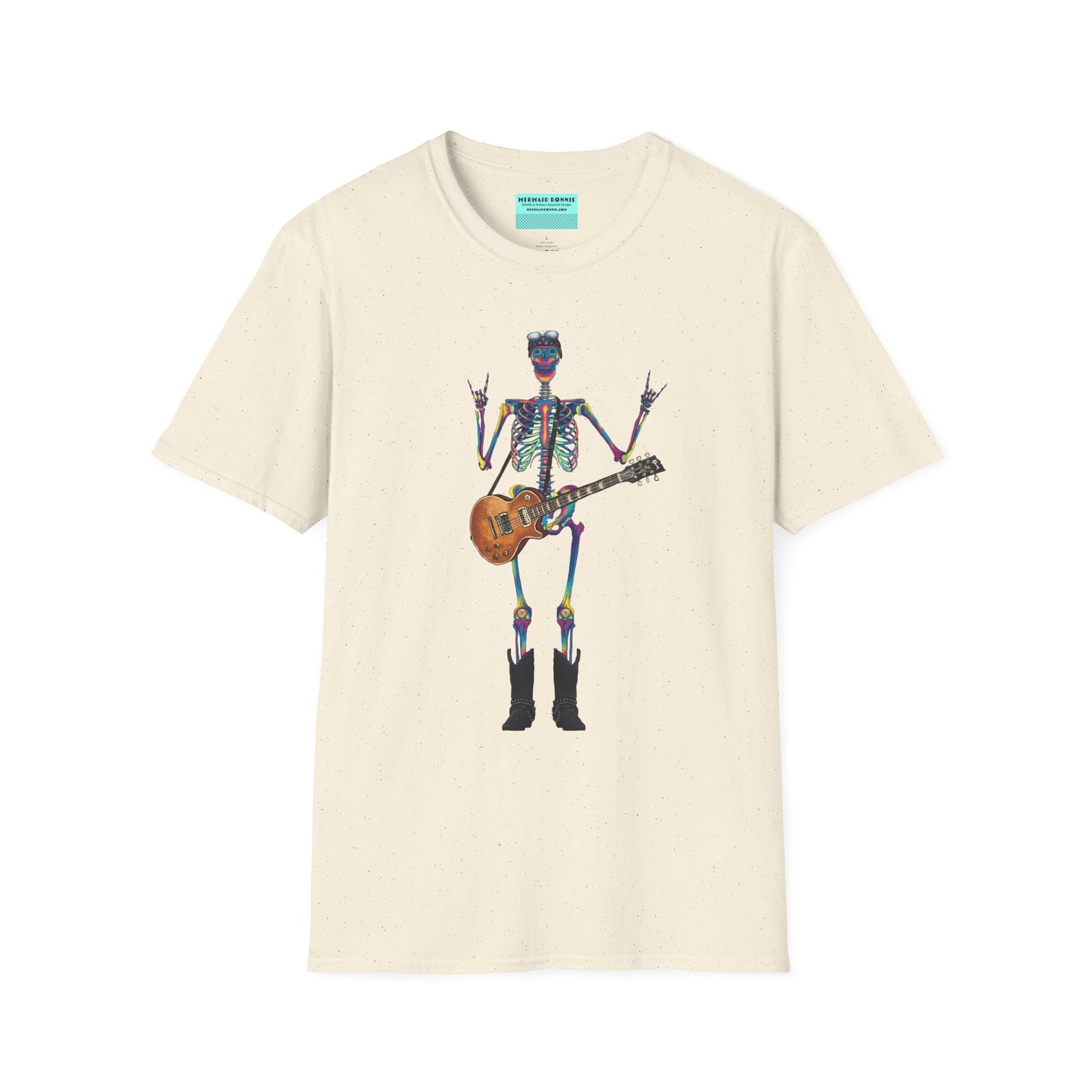 Beige t-shirt featuring a tie-dye skeleton holding a guitar, dressed like a classic rocker with boots, a bandana, and rock-style clothing.