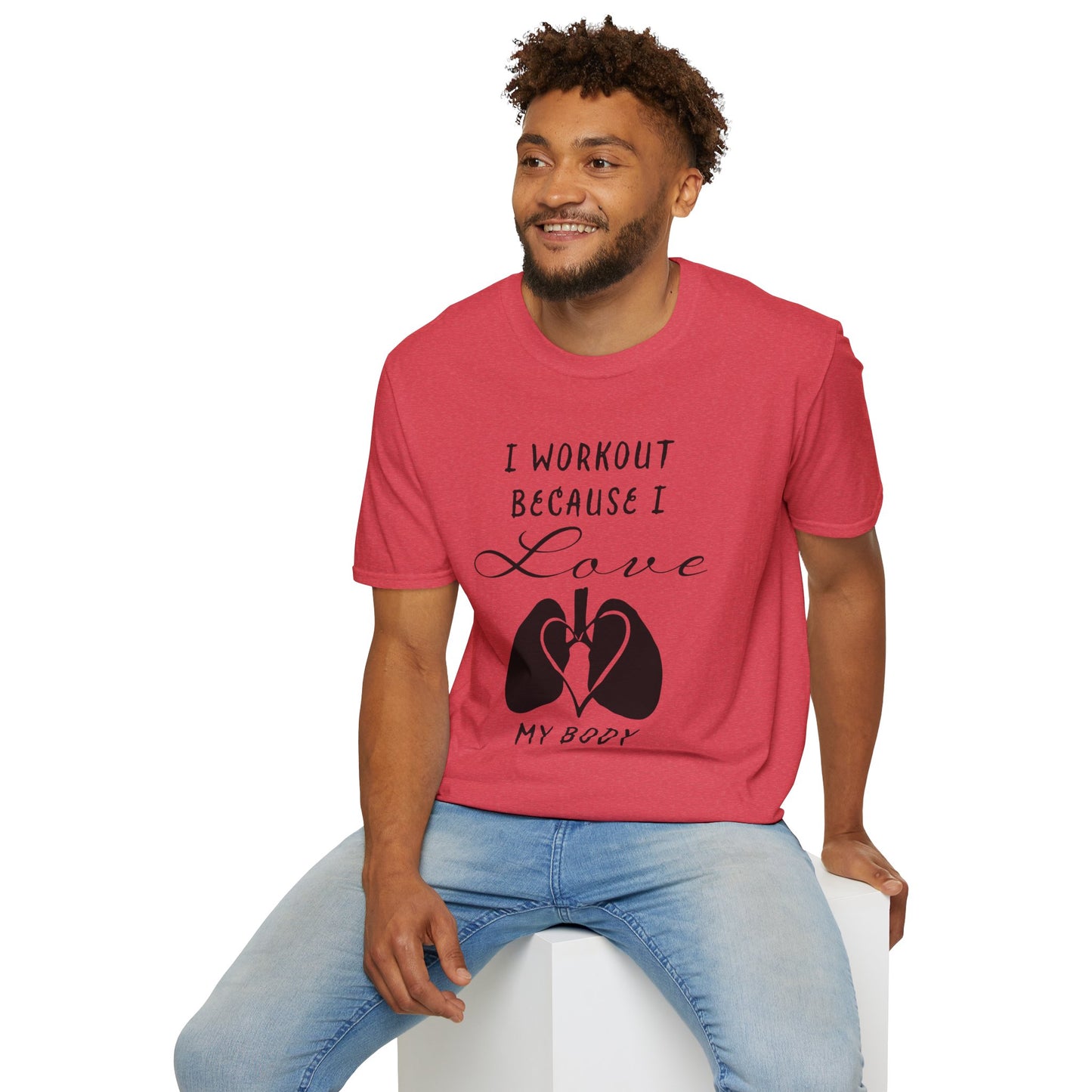 Man wearing a red unisex short sleeve t-shirt with a bold message: "I workout because I love my body," paired with a simple drawing of a heart and lungs—because cardio is more than a vibe, it’s biology.