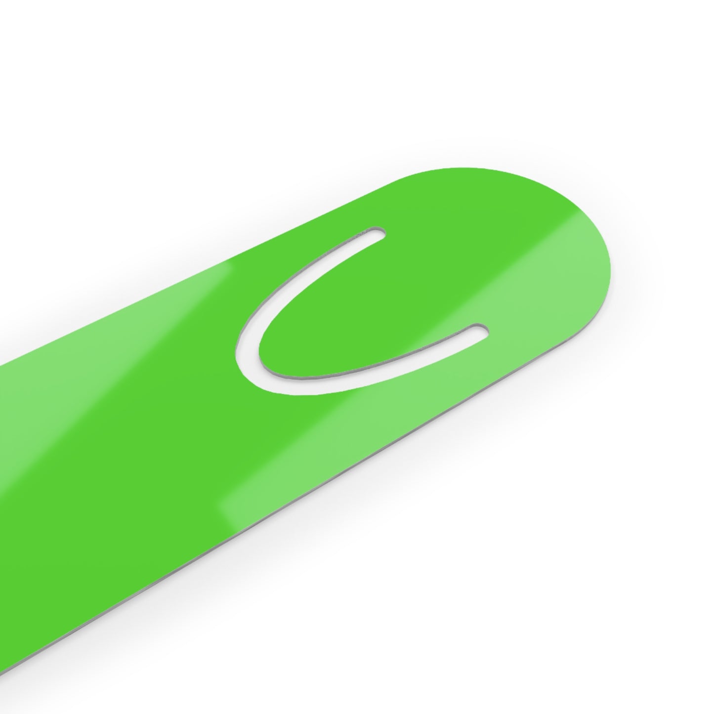 An up-close view of the clip of a lime-green bookmark.