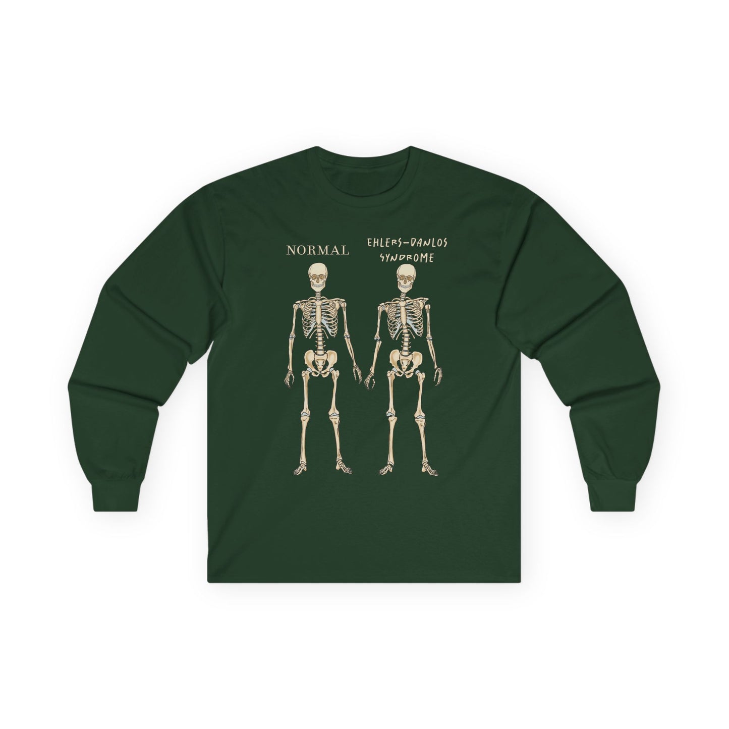 A forest green long sleeve shirt with two skeletons side by side—one labeled "normal," the other "Ehlers-Danlos Syndrome"—visually showcasing the effects of EDS with a clever, anatomy-inspired twist.