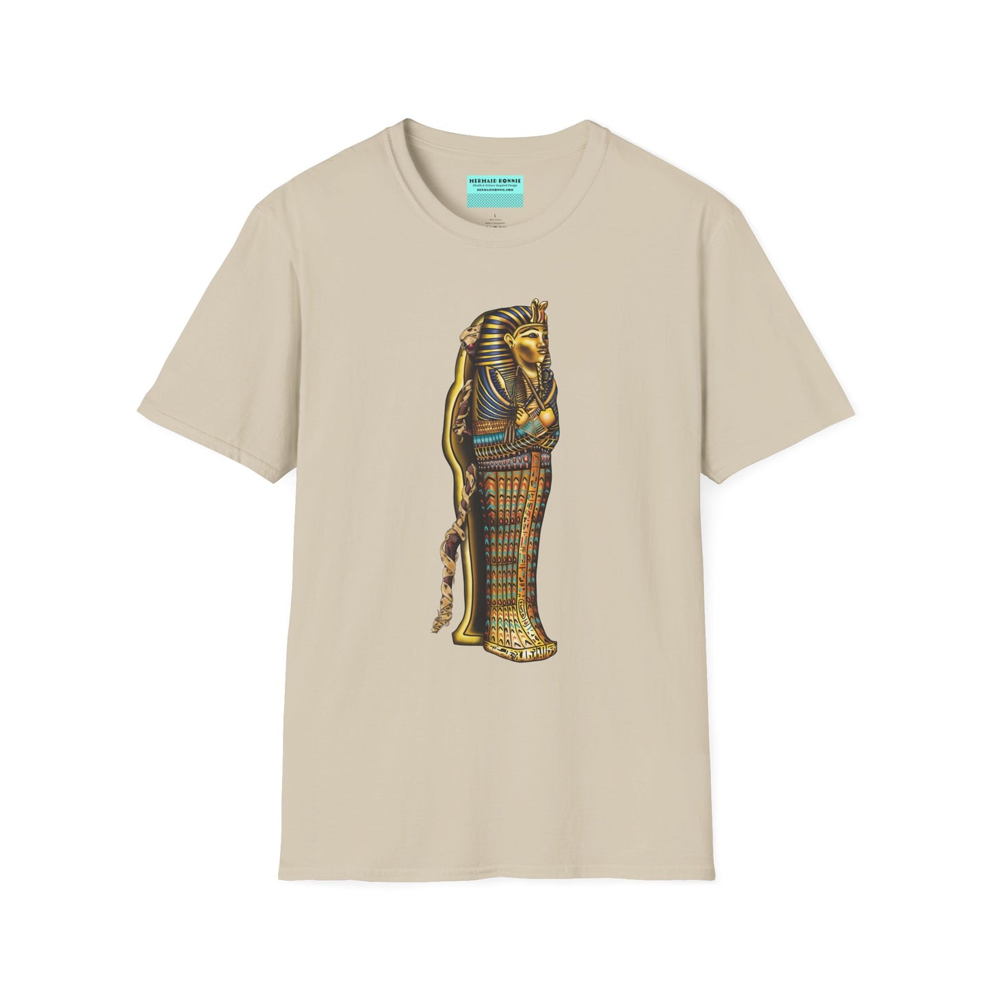 Beige t-shirt featuring an illustration of an Egyptian sarcophagus, with a mummy stepping out of it and glowing red eyes.