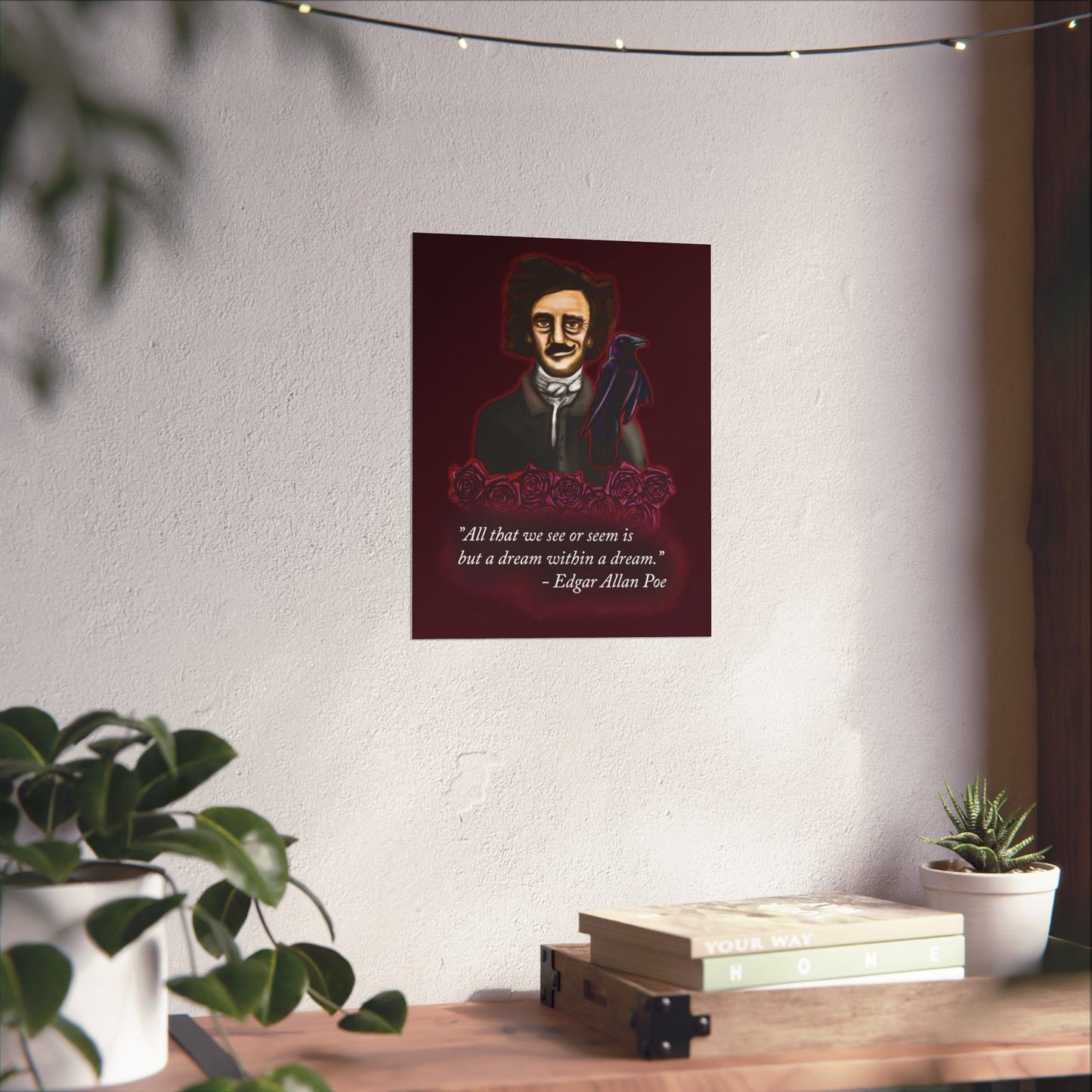 A small moody poster of Edgar Allan Poe, wearing a wry smile as he’s surrounded by crimson roses and a raven, with a rich burgundy background—because even the master of macabre has a soft spot for gothic romance.