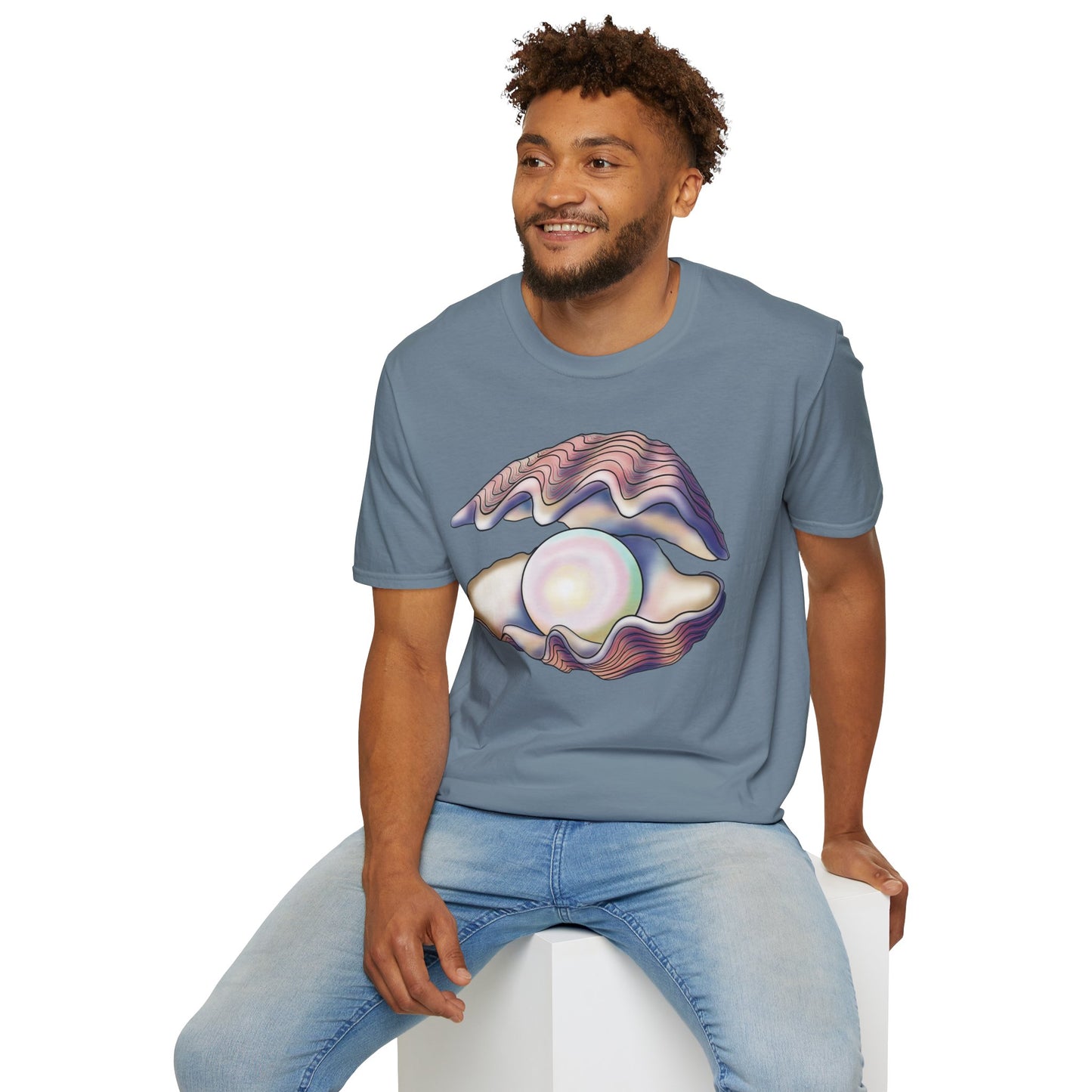 Man wearing a blue t-shirt featuring an illustration of a large oyster with a luminescent pearl inside.