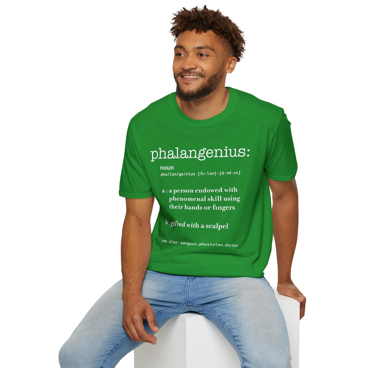Man wearing a green t-shirt featuring a dictionary-style definition of the term 'Phalangenius,' a humorous play on the terms 'phalange' and 'genius,' aimed at surgeons.