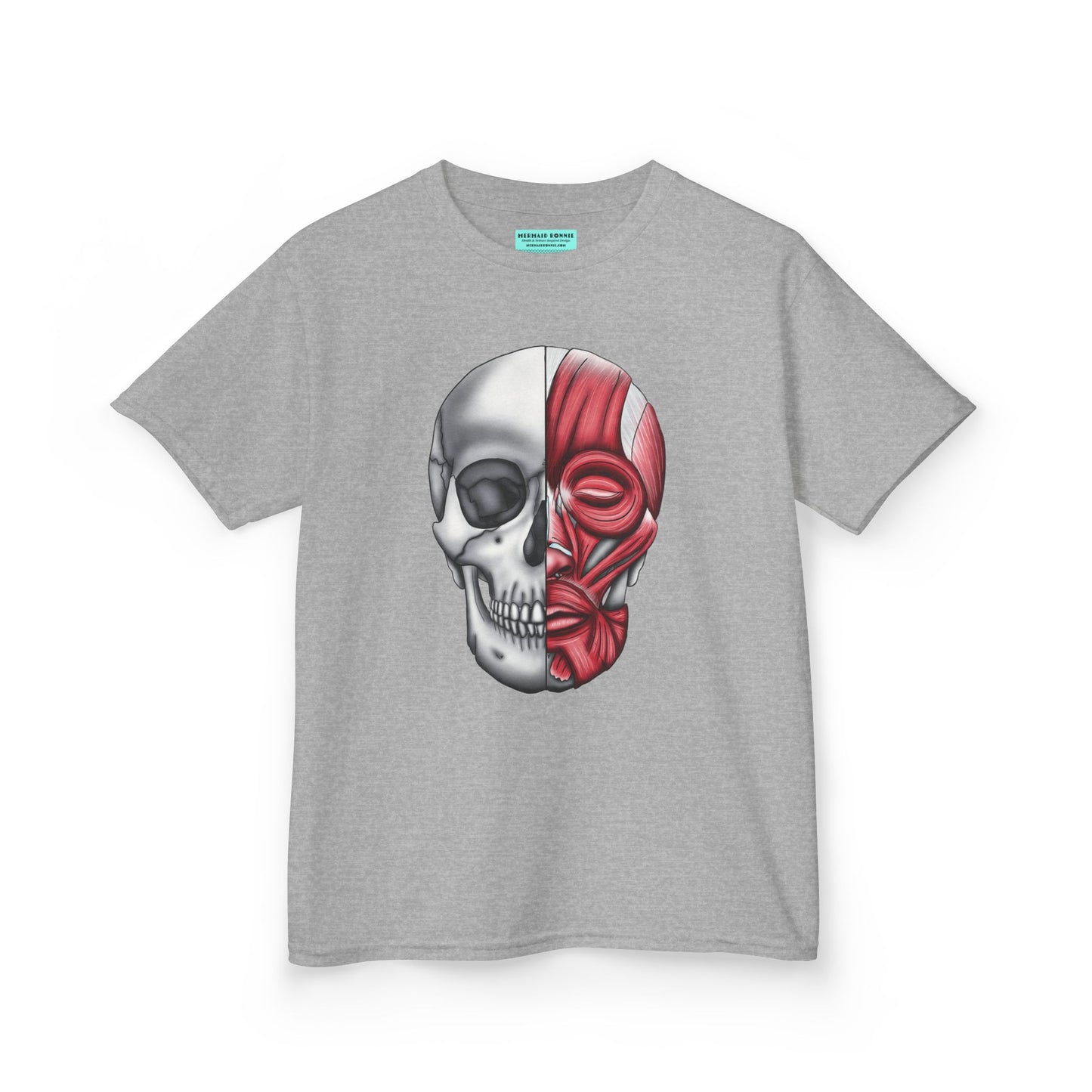 Kids' t-shirt in grey featuring an anatomical drawing of a human skull, with facial muscles illustrated on one half of the skull.