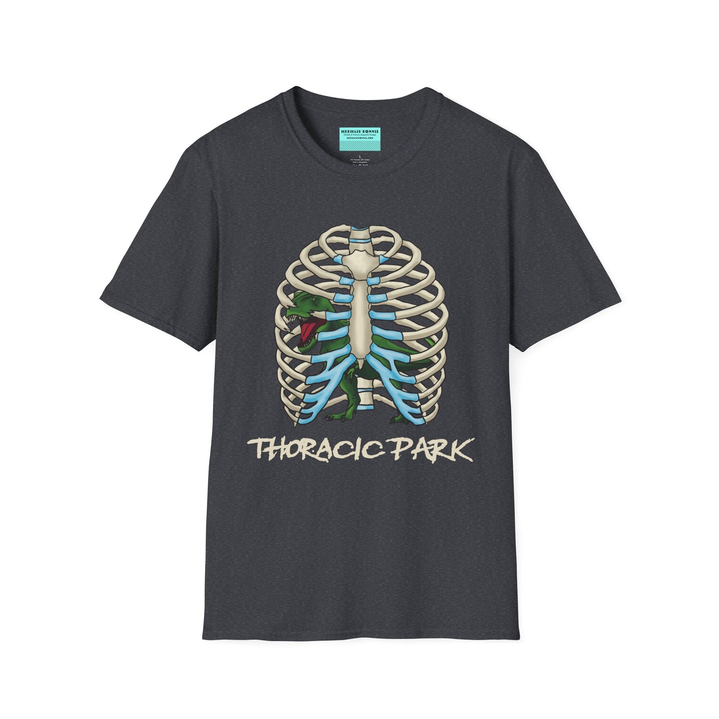 Dark grey unisex short sleeve tee with a clever Jurassic twist—an anatomical rib cage doubles as a prehistoric prison for a tiny T-Rex, with the punny caption "Thoracic Park" below. It's dino-mite meets anatomy class in the best way possible.