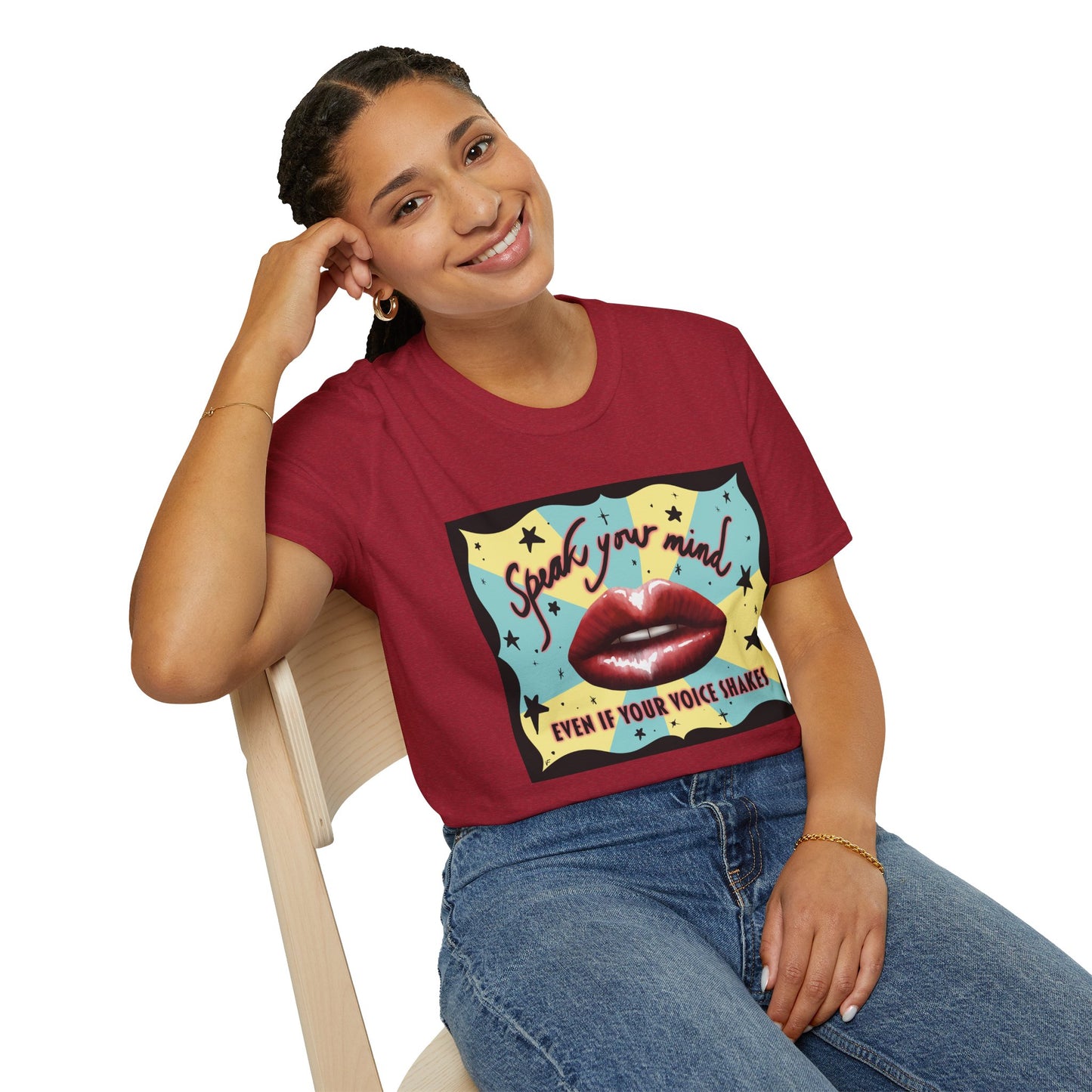 Woman wearing a red t-shirt featuring an illustration of red lips and the phrase 'Speak your mind, even if your voice shakes.'