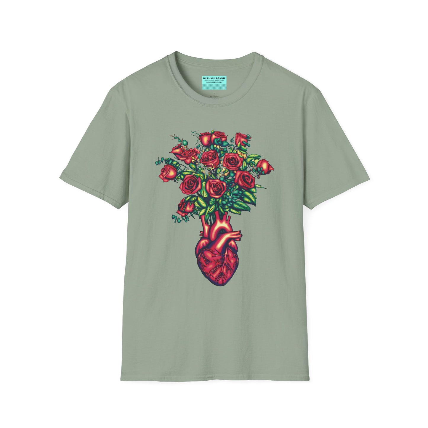 Green shirt featuring an illustration of an anatomical heart used as a vase, with a bouquet of roses emerging from it.