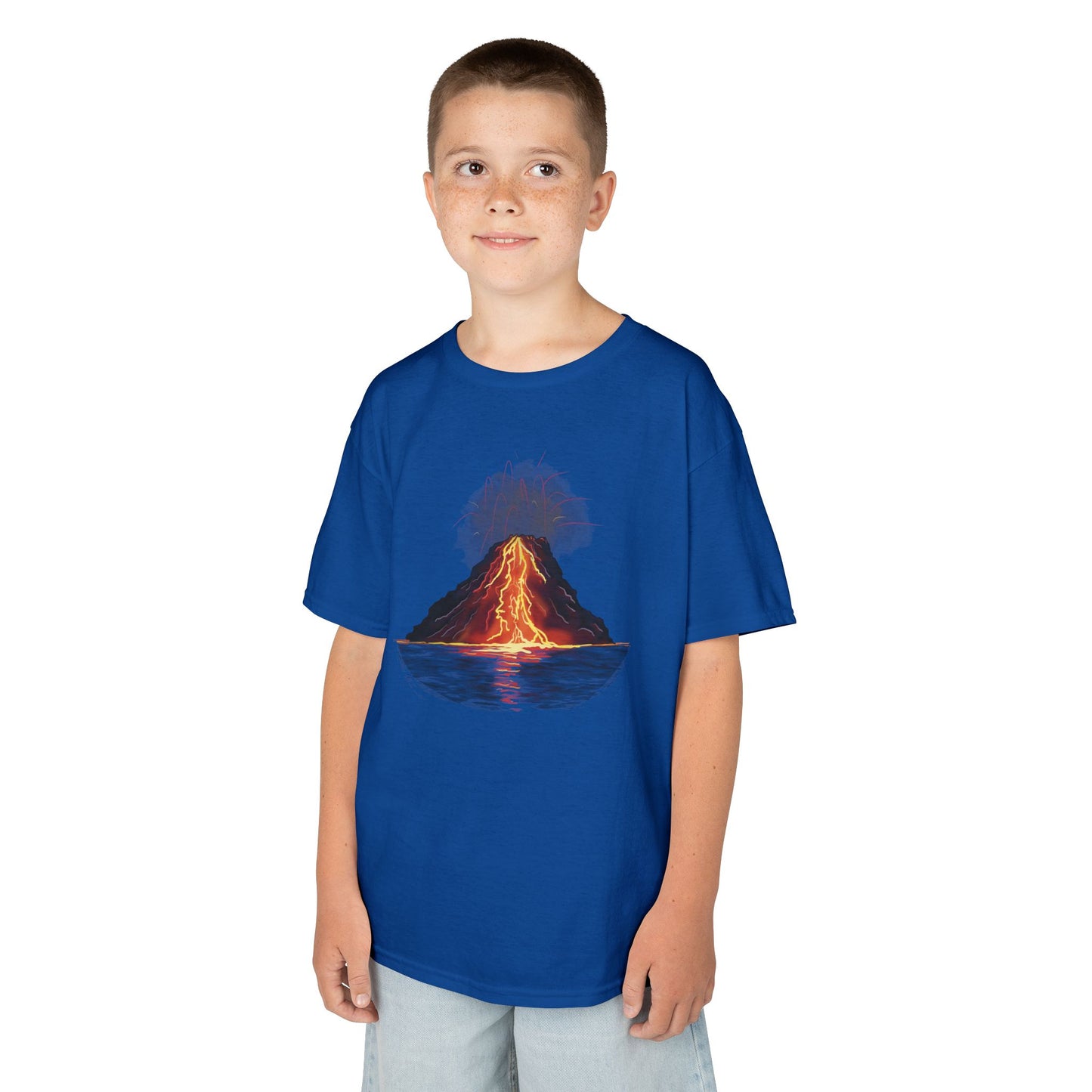 A boy wearing a royal blue kid's t-shirt featuring a fiery illustration of an erupting volcano—because even the most explosive adventures start with a great outfit!