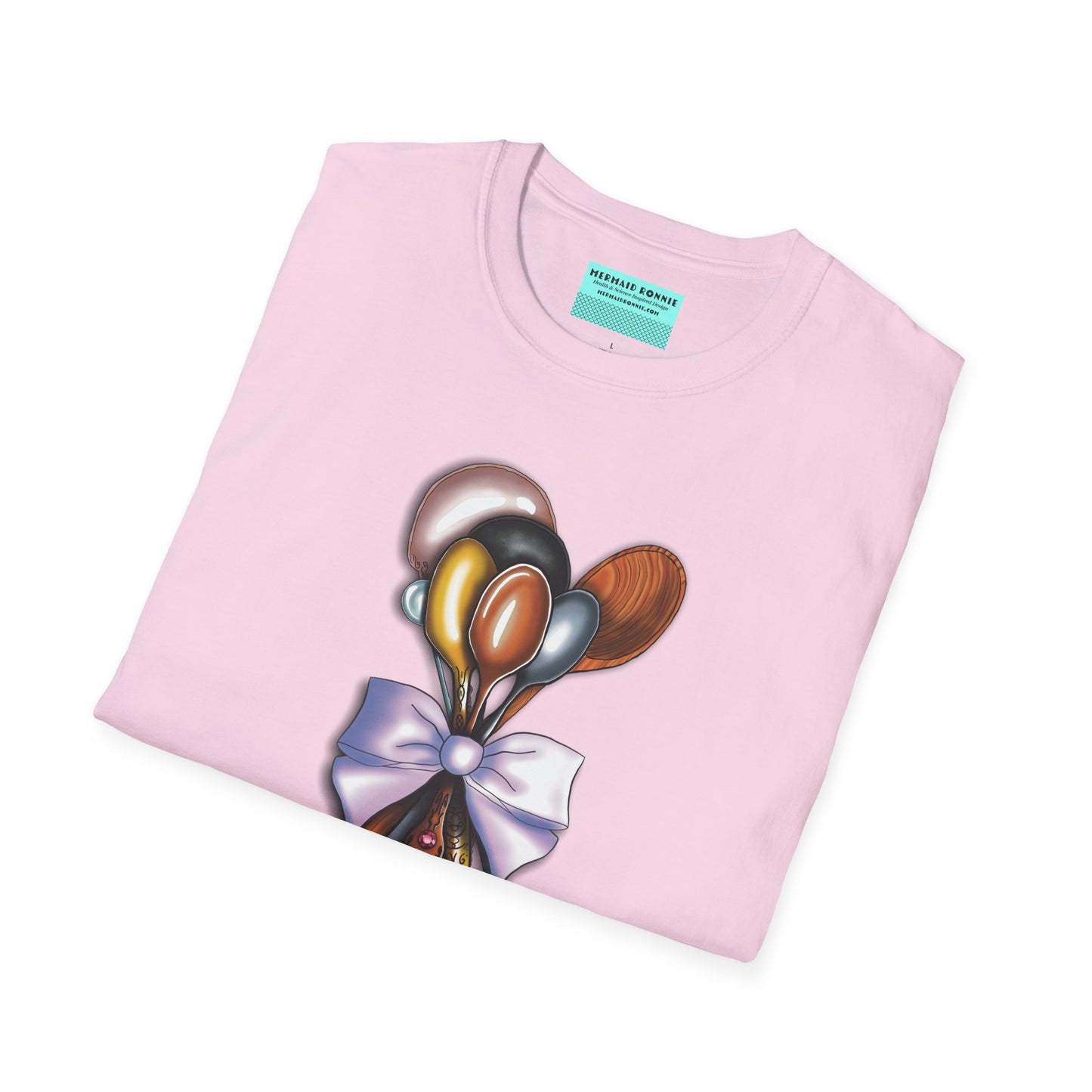 Folded pink t-shirt with an illustration of a bouquet of spoons and the phrase 'I saved my spoons to be here' printed on the front.