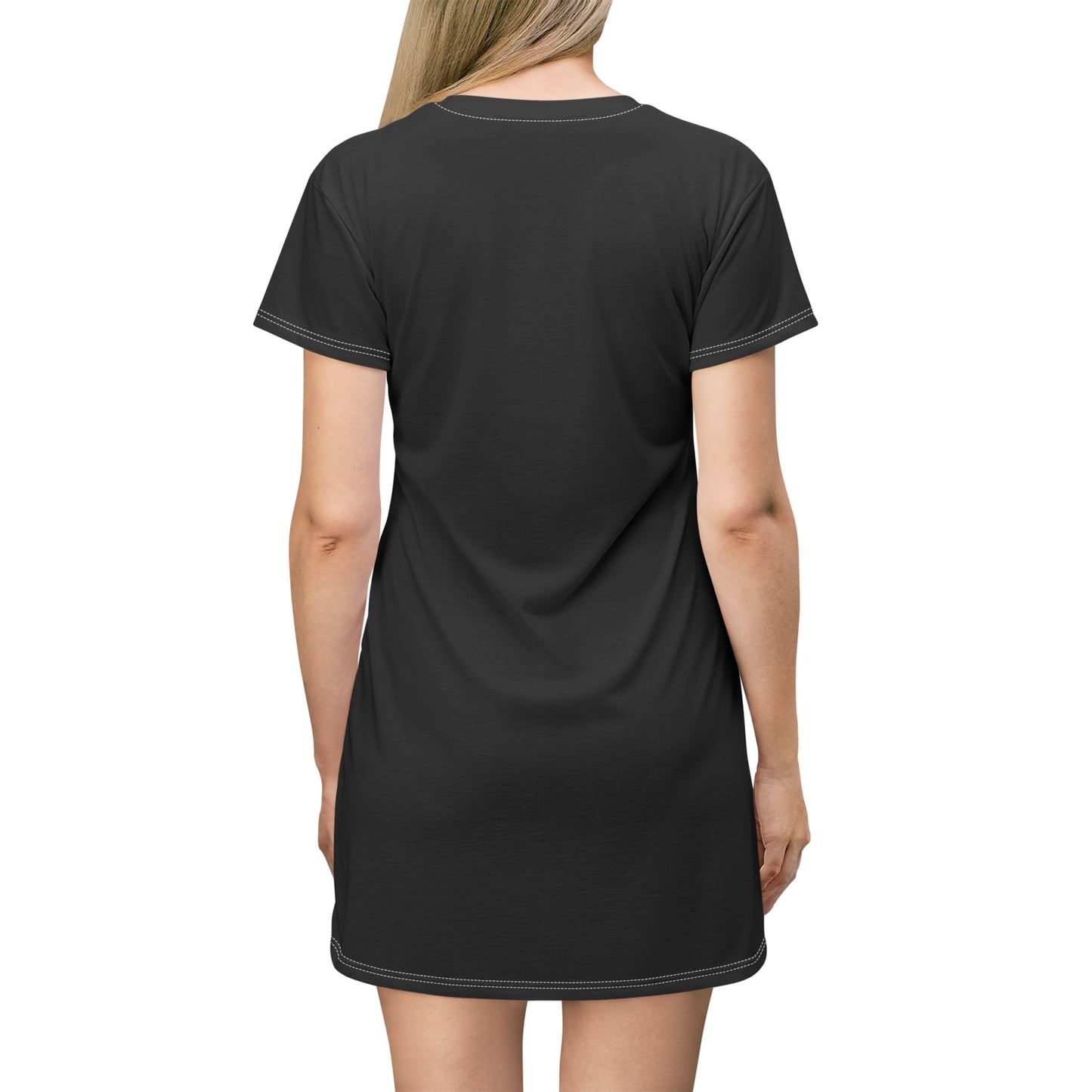 Posterior view of a woman wearing a black t-shirt dress with white stitching