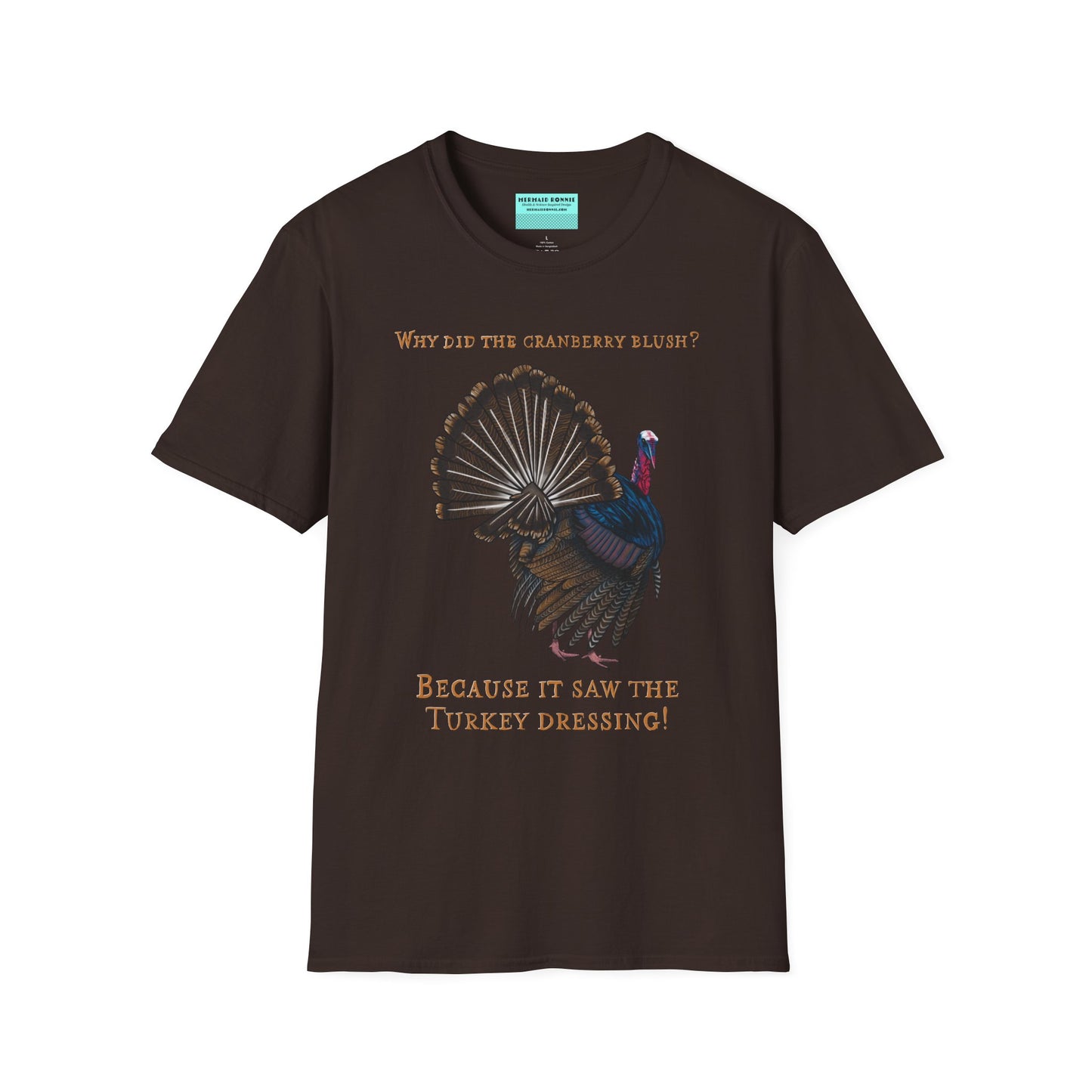 Brown Thanksgiving t-shirt featuring a picture of a turkey and the text 'Why did the cranberry blush? Because it saw the turkey dressing!