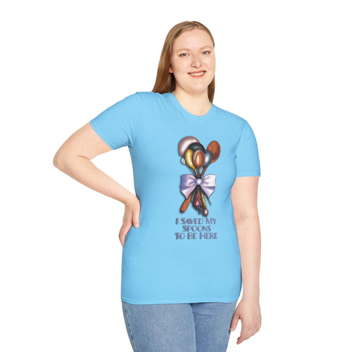 Woman wearing a blue t-shirt featuring a bouquet of spoons illustration and the phrase 'I saved my spoons to be here' on the front.