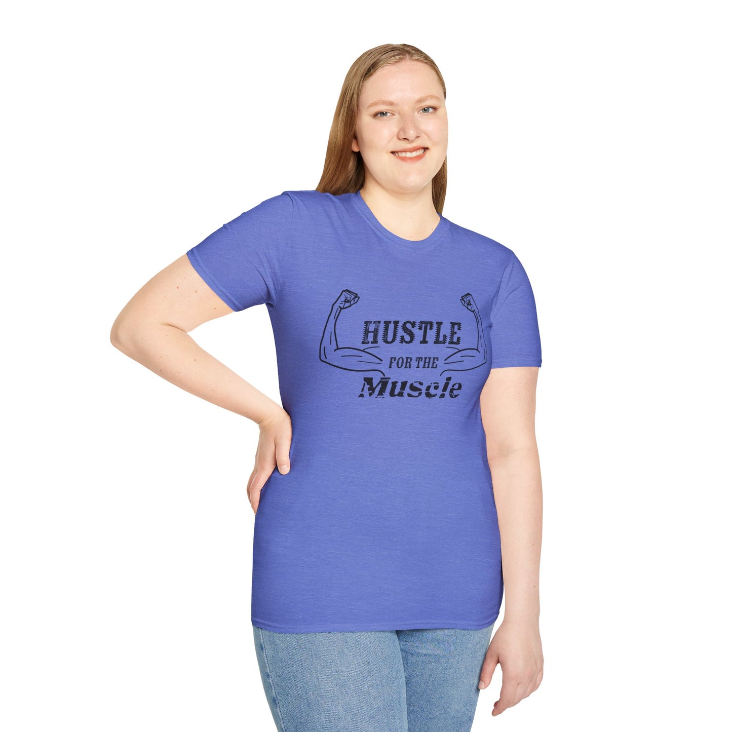 Woman wearing a blue unisex short sleeve t-shirt with a bold graphic of strong, flexed feminine arms and the empowering phrase "Hustle for the Muscle"—because strength is stylish and lifting is for everyone.