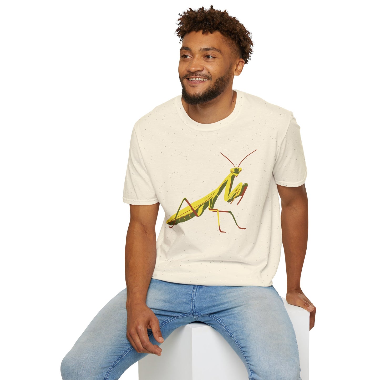 Man wearing a beige shirt featuring an illustration of a green praying mantis on the front.