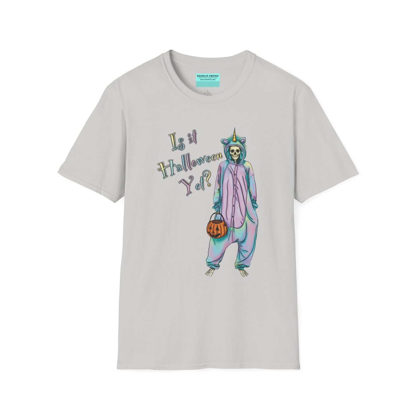 Grey t-shirt featuring a drawing of a skeleton in a unicorn costume onesie, with the phrase 'Is it Halloween yet?' printed on it.
