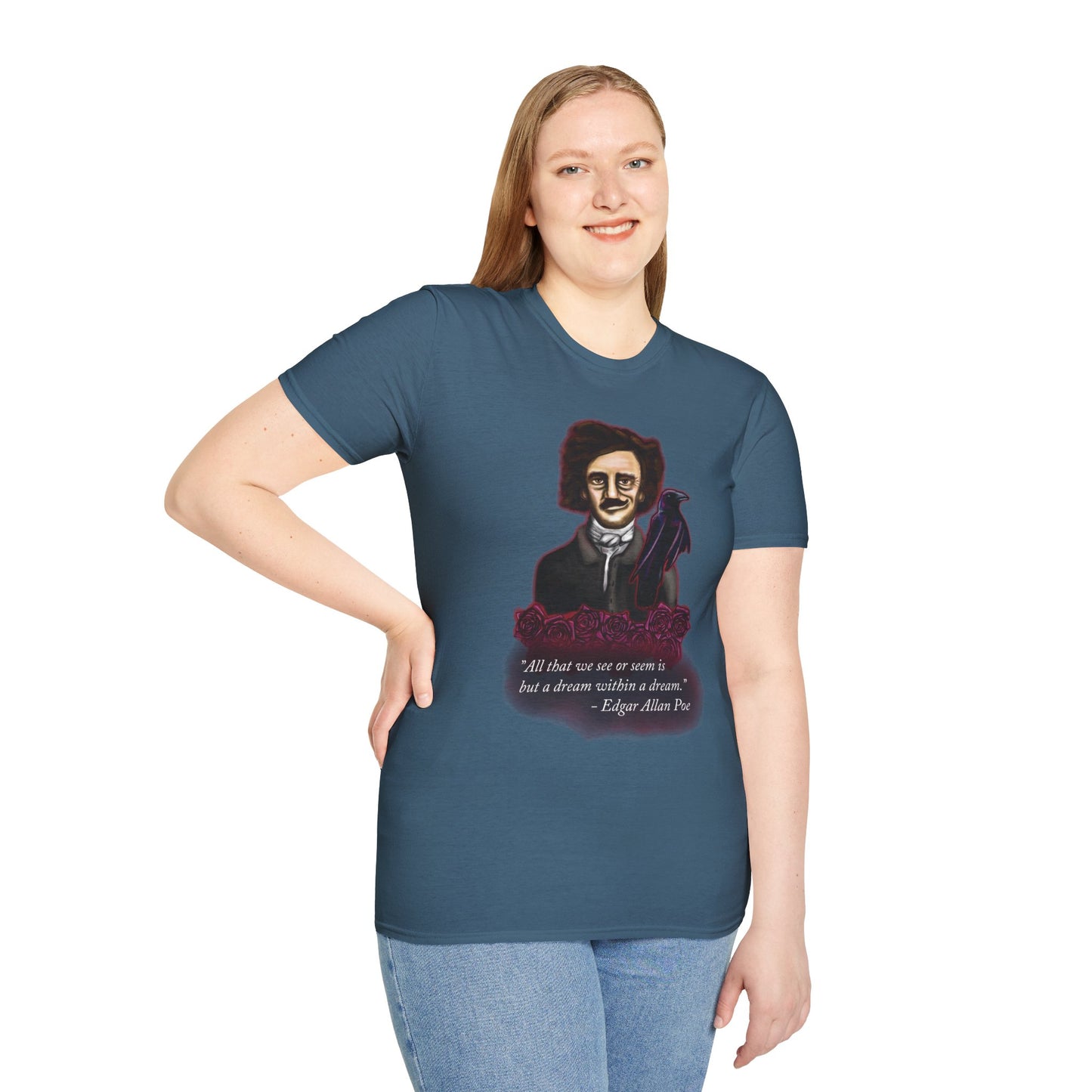 Woman wearing a blue t-shirt featuring a drawing of Edgar Allan Poe with a raven perched nearby and red roses surrounding them, along with the quote 'All that we see or seem is but a dream within a dream.'