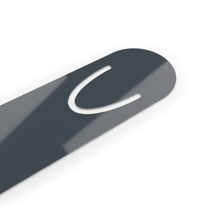 Close view of a dark grey-blue aluminum bookmark featuring a portrait of Sigmund Freud with humorous text that reads 'Yo Mama – Sigmund Freud.