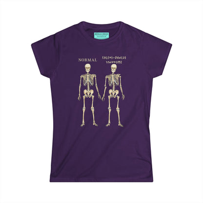 Women’s t-shirt in dark purple with two skeletons side by side. The first is labeled 'Normal' and the second is labeled 'Ehlers-Danlos Syndrome,' visually illustrating the skeletal effects of EDS.