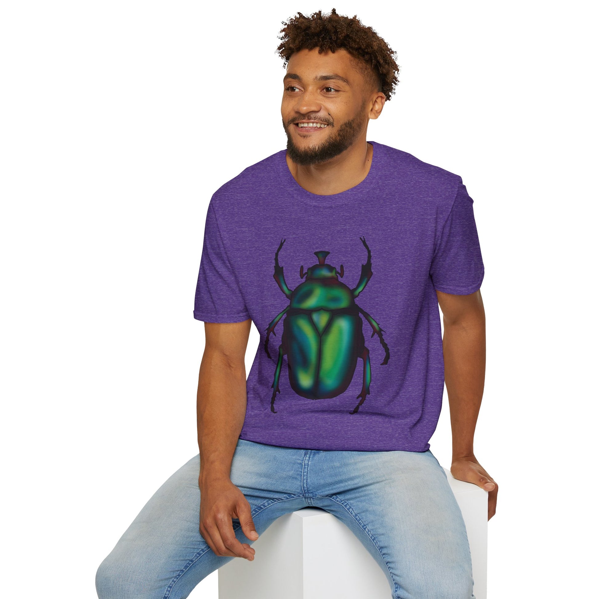 Purple t-shirt featuring a picture of honeybees buzzing around a large piece of honeycomb with honey dripping down from it.